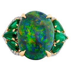 Platinum and 18K Yellow Gold Black Opal, Emerald and Diamond Ring