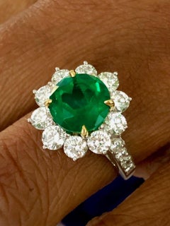 Platinum and 18 Karat Yellow Gold, 2.91 CT Emerald and Diamond Ring