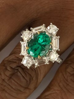 Platinum and 18 Karat Yellow Gold, 2.42 CT Emerald and Diamond Ring