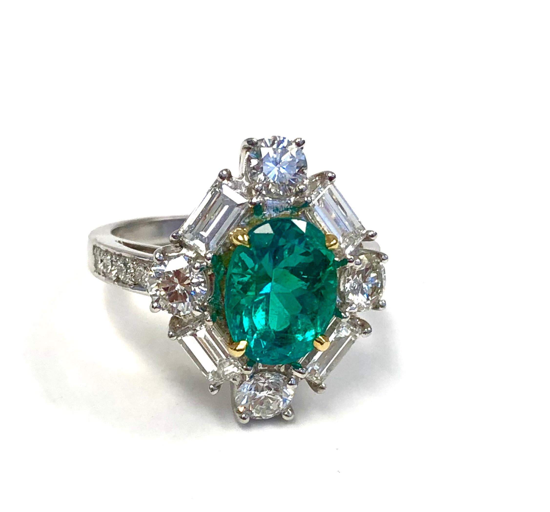 Contemporary Platinum and 18 Karat Yellow Gold, 2.42 CT Emerald and Diamond Ring For Sale