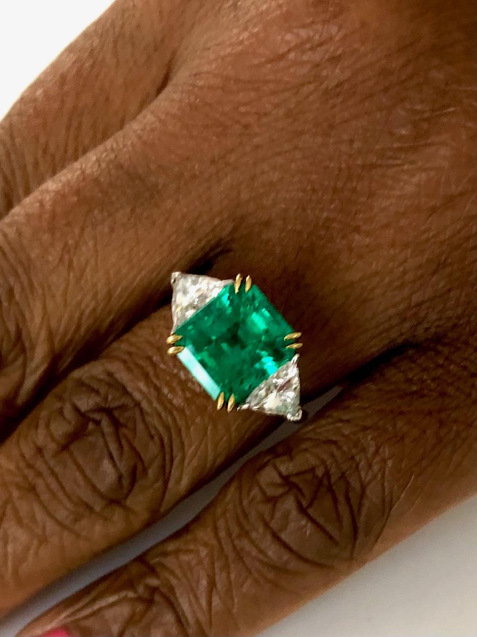 Contemporary Platinum and 18 Karat Yellow Gold 3.47 Carat Emerald and Diamond Ring For Sale