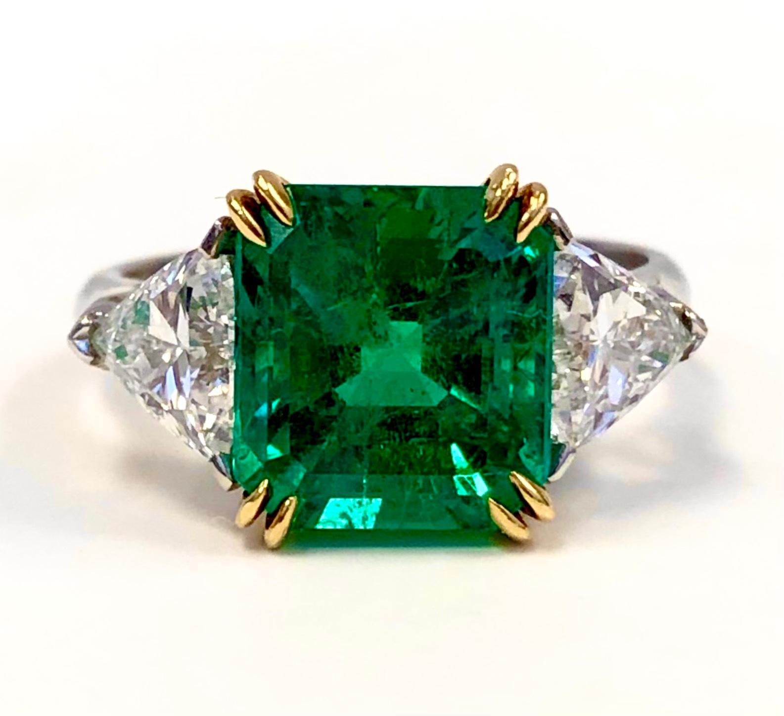 Emerald Cut Platinum and 18 Karat Yellow Gold 3.47 Carat Emerald and Diamond Ring For Sale