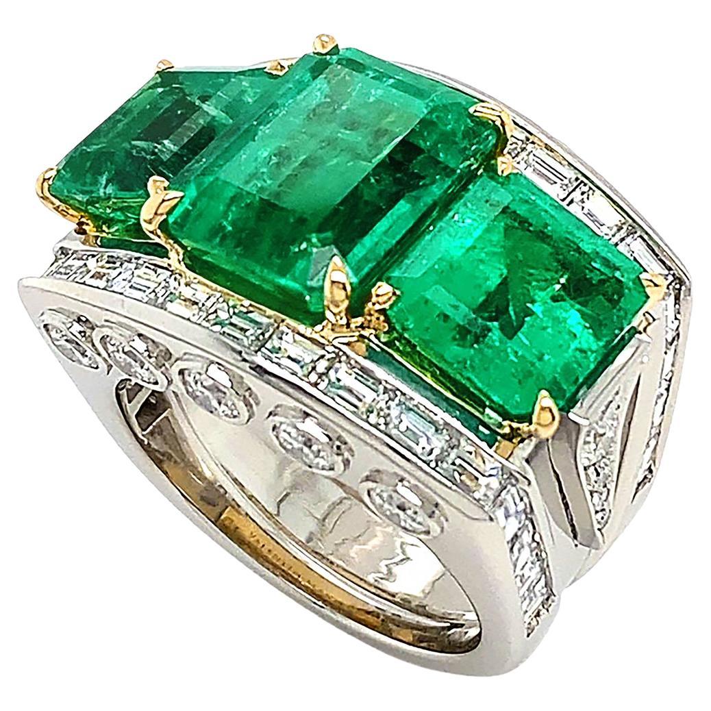 Platinum and 18K Yellow Gold Emerald Trio and Diamond Ring