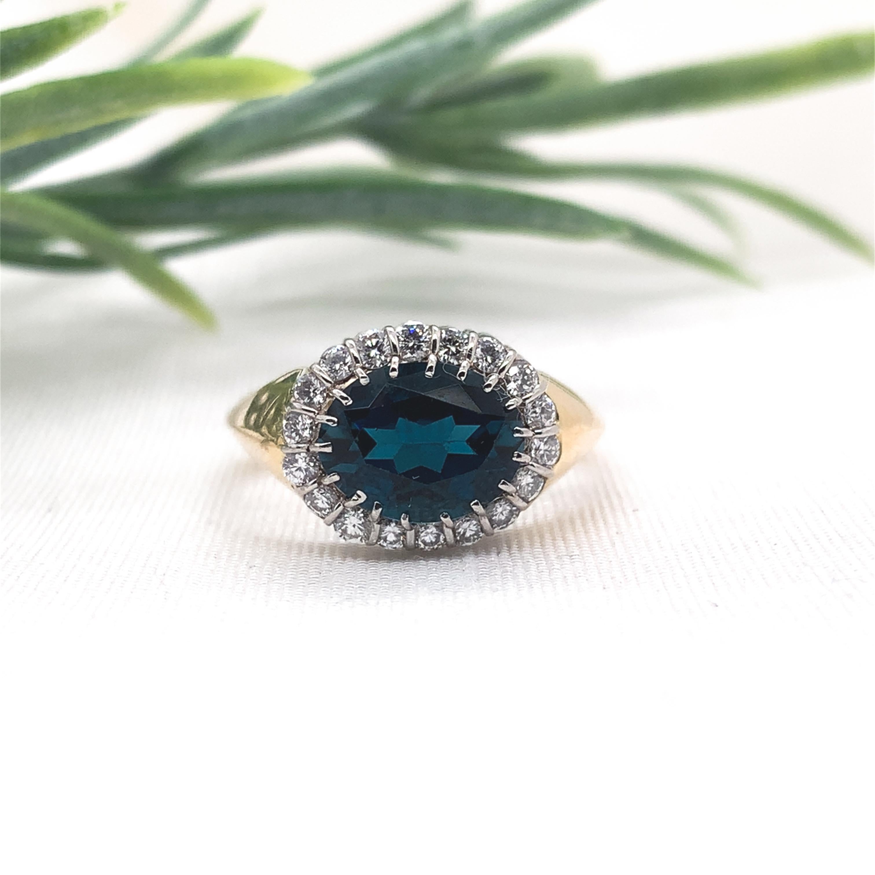 Platinum and 18K Yellow Gold Teal Blue Topaz and Diamond Ring size 6 For Sale 3