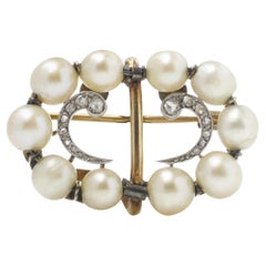Platinum and 18kt yellow gold natural pearl and diamond brooch