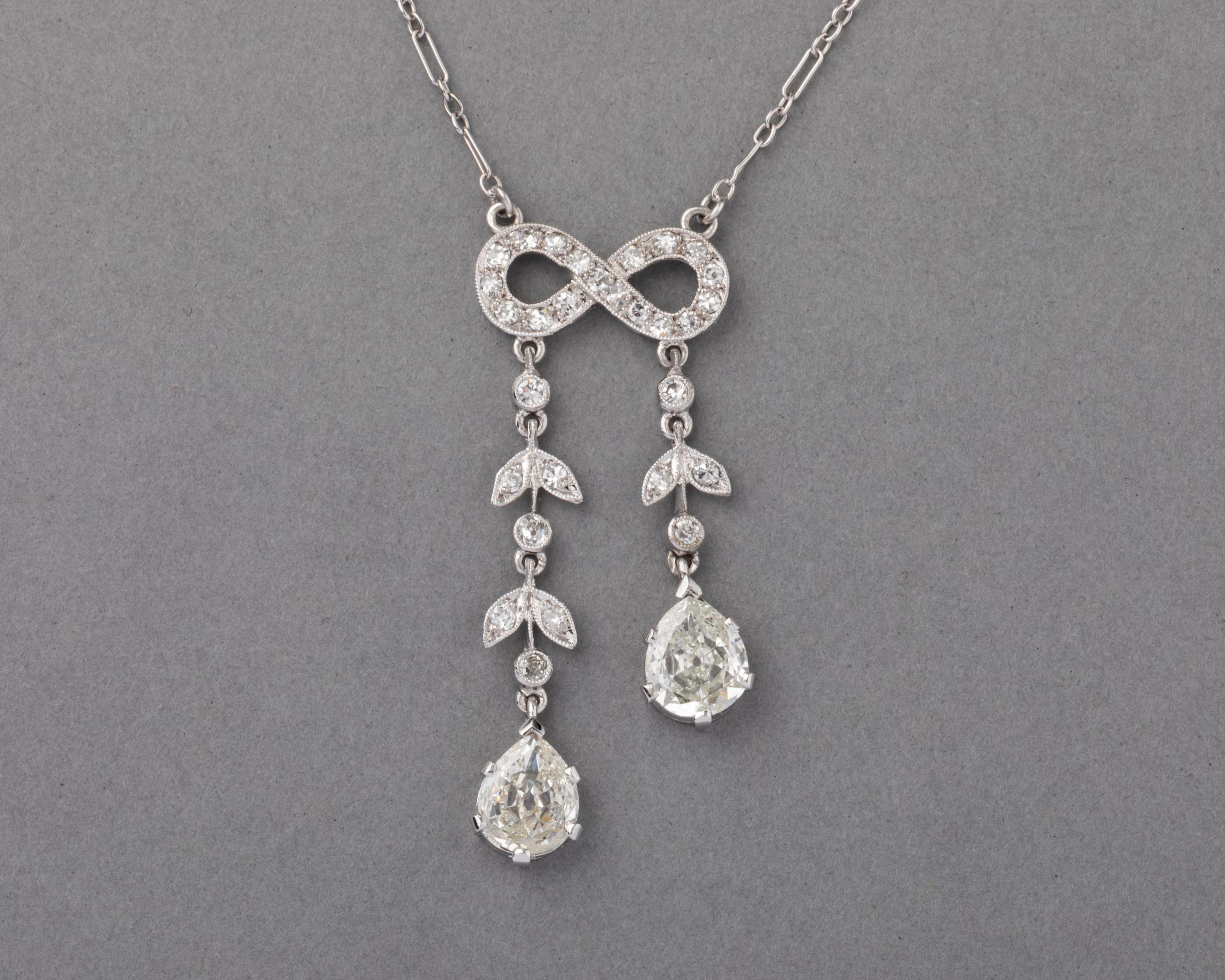 Very lovely antique necklace, French made circa 1910.
Made in Platinum and set with two pear diamonds of 0.75 Carats each. 1.90 carats total for the diamonds. The two pear are clear, the color estimate is J.
The length of necklace is 40 cm or 16