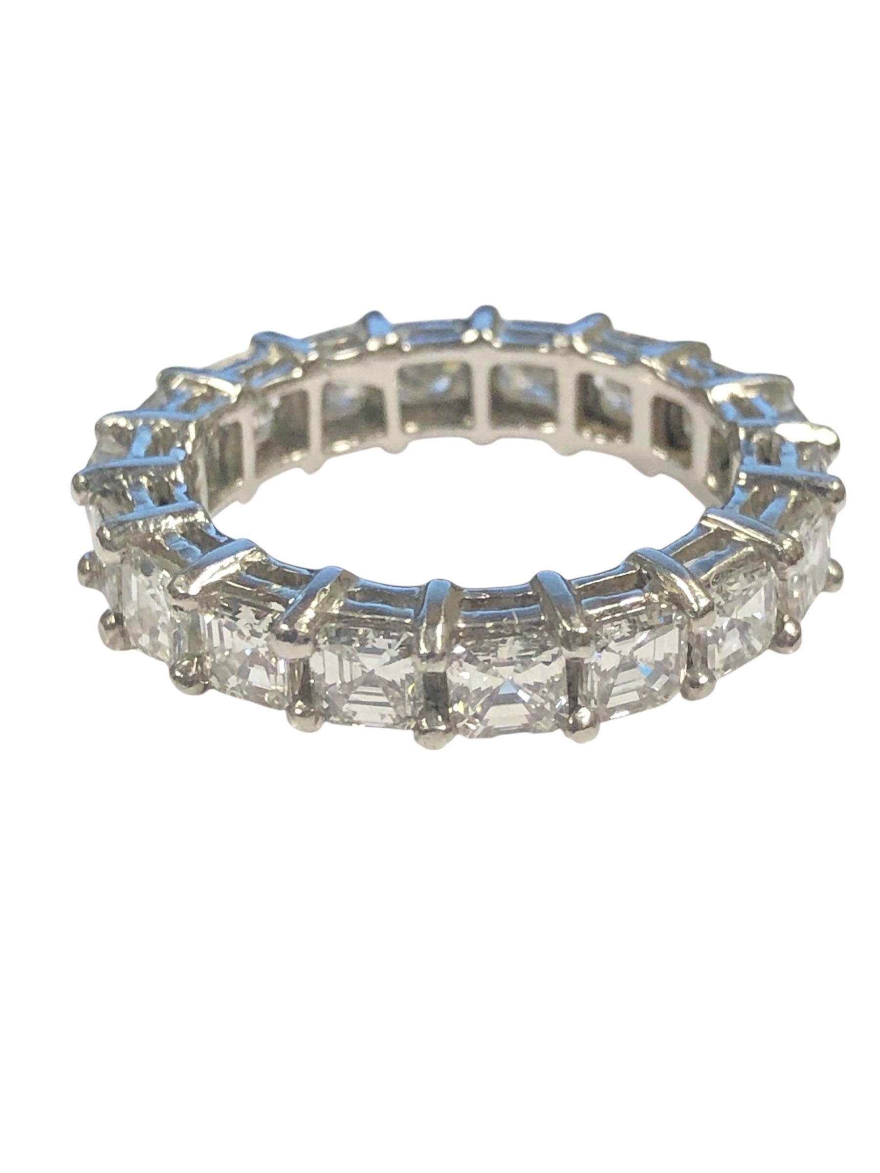 Circa 2000 Platinum Eternity Band Ring, measuring 4 M.M. wide and is set with Asscher cut Diamonds totaling 3.50 Carats and grading as G in color and VS in clarity. Finger size 6.
