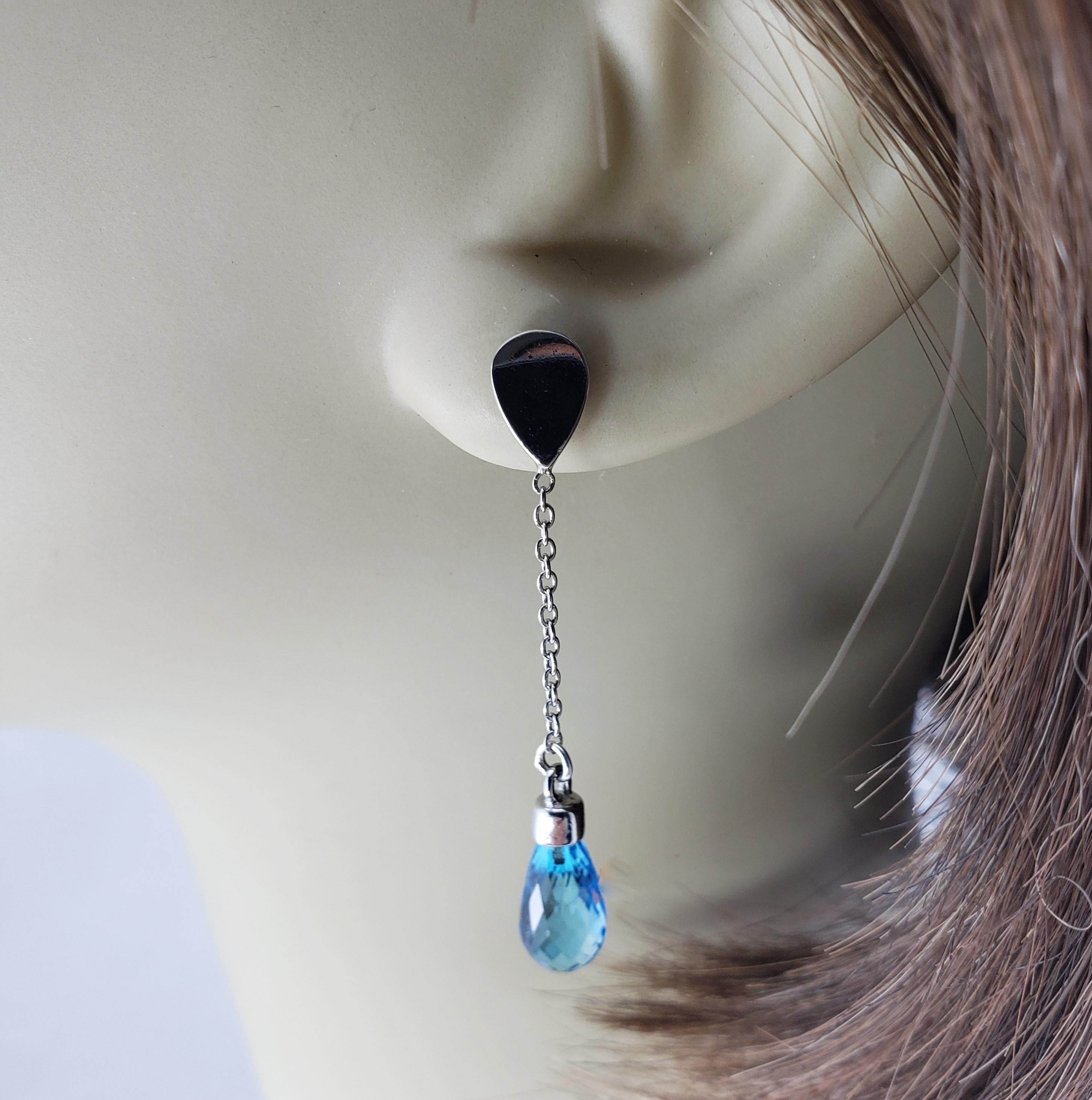 Platinum and Genuine Blue Topaz Dangle Earrings For Sale 2