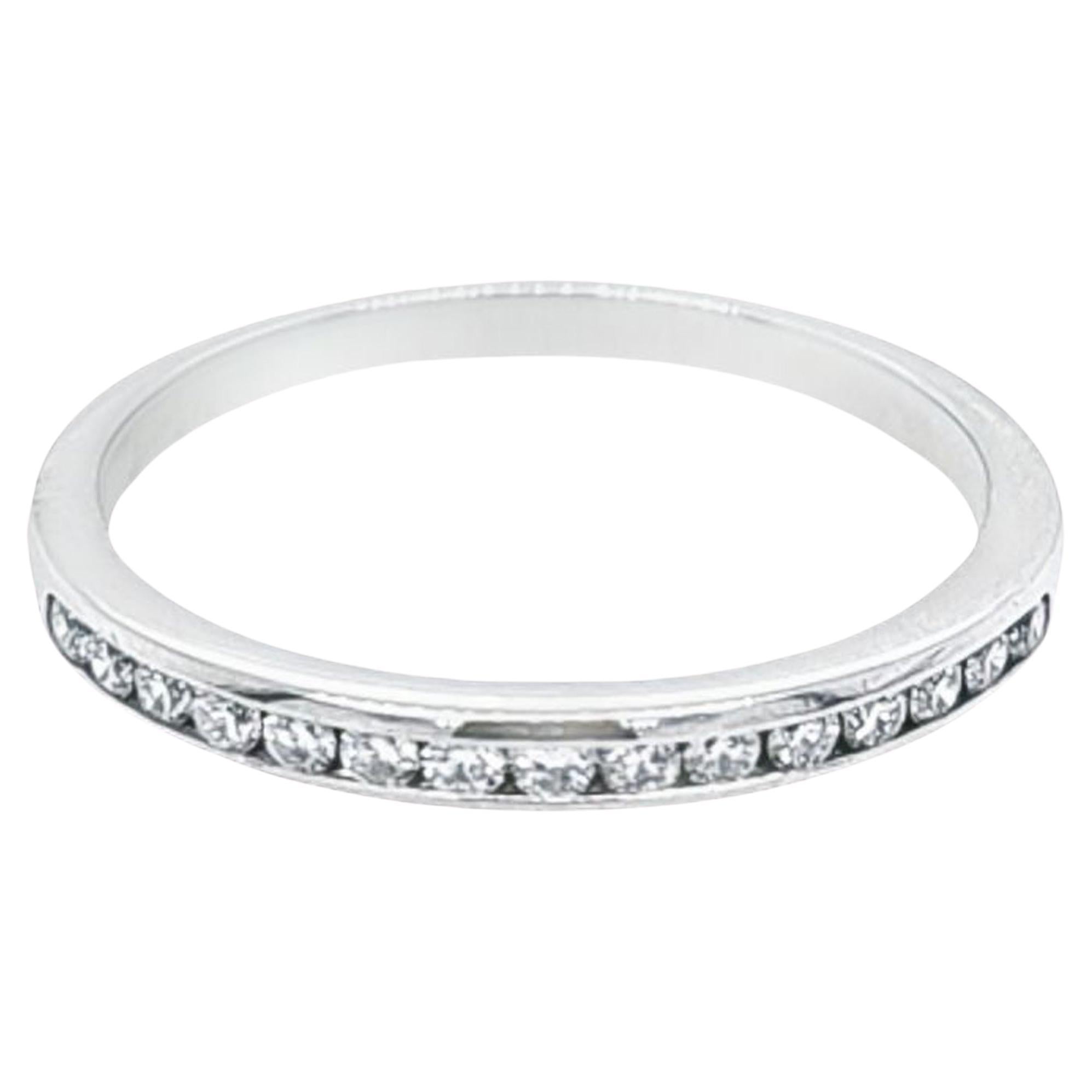 Platinum and Channel Set Round Diamond Ring