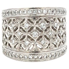 Contemporary 0.84 TCW Hand Carved Openwork Platinum and Diamond Band