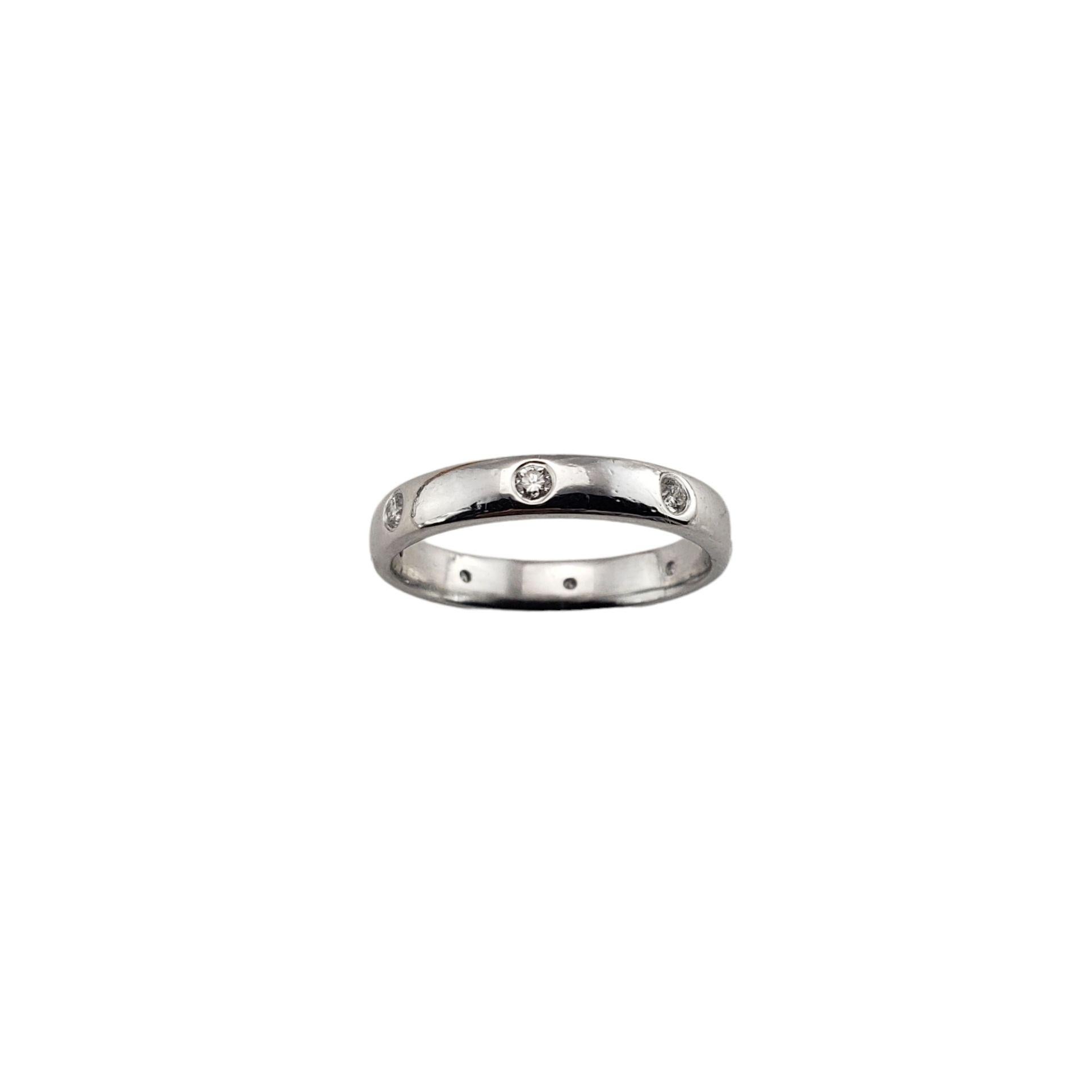 Vintage Platinum and Diamond Band Ring Size 4.5-

This elegant band features eight round brilliant cut diamonds set in classic platinum. Width: 3 mm.

Approximate total diamond weight: .24 ct.

Diamond clarity: SI1

Diamond color: G

Ring Size: