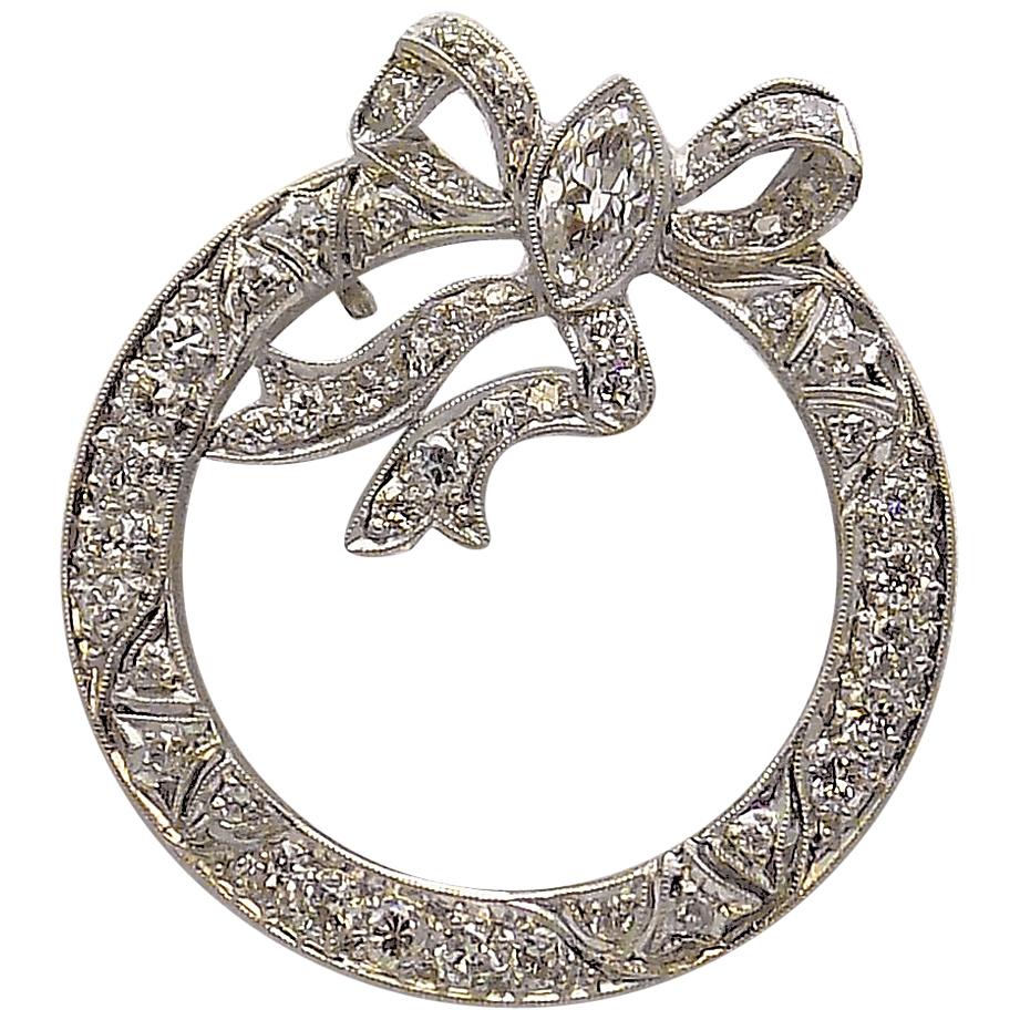Platinum and Diamond Bow Brooch For Sale