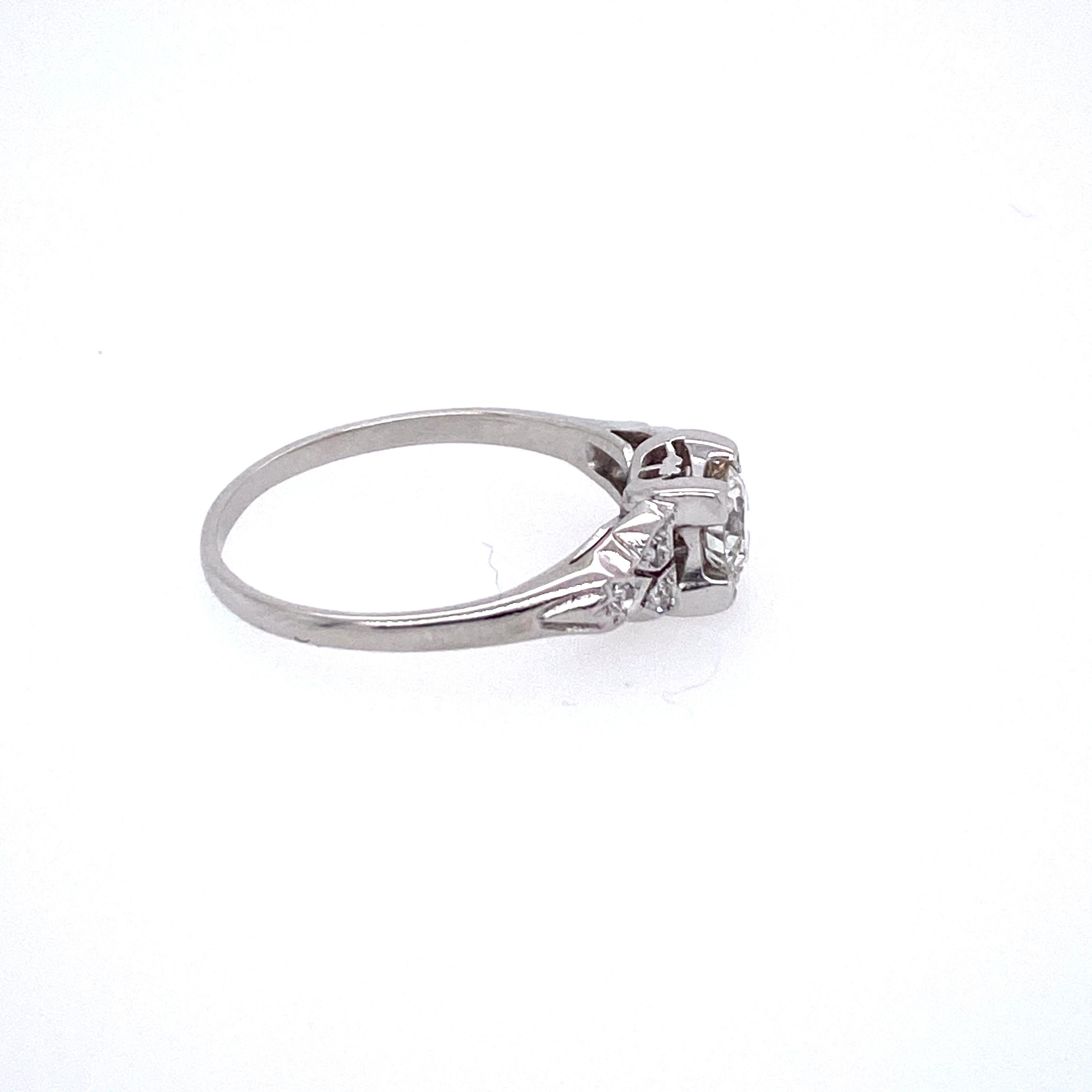 Retro Platinum and Diamond Engagement Ring