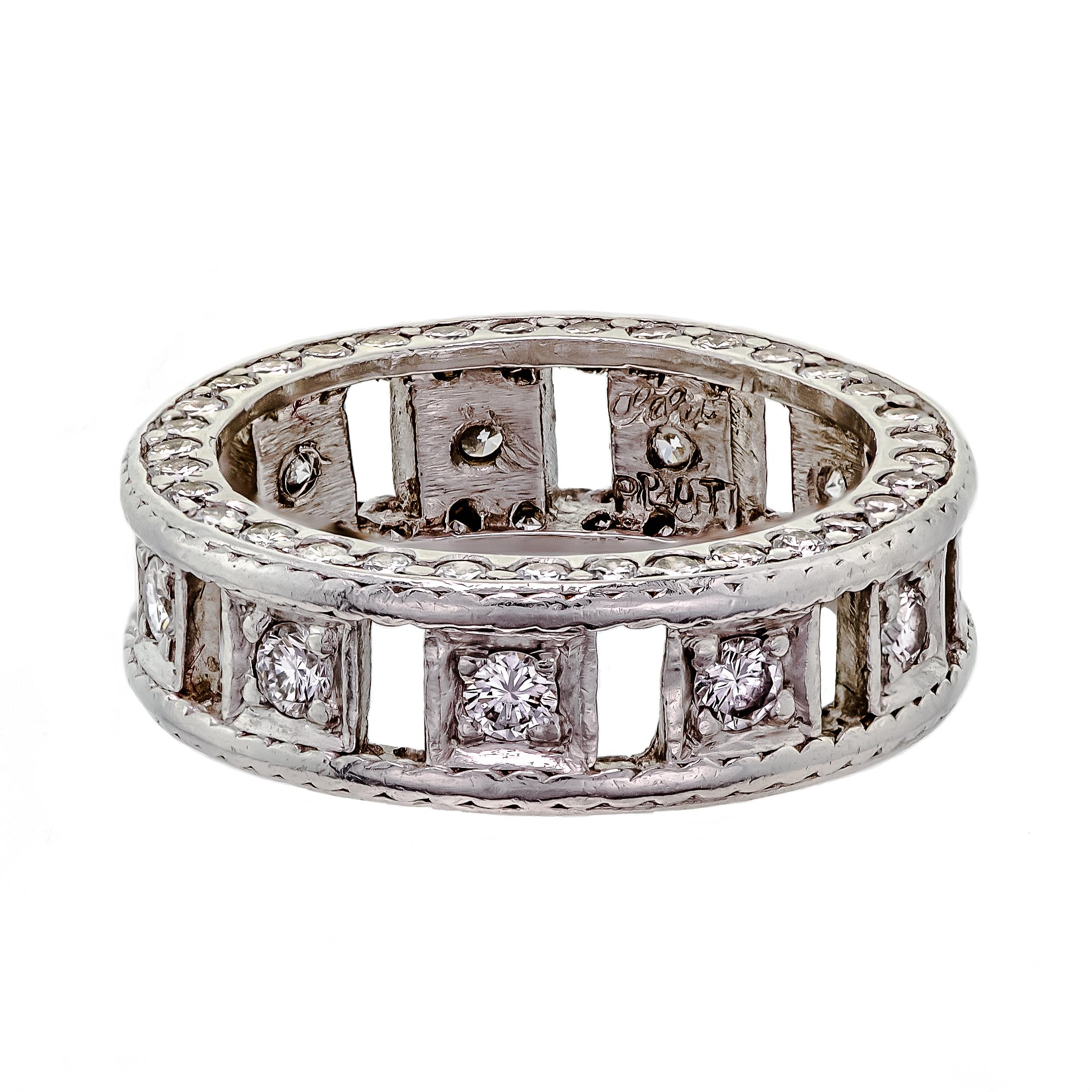 Diamond and platinum eternity band. Open platinum eternity band set with round brilliant cut diamonds on the top and sides. Total Estimated Diamond Weight 1.50ct

Size: 5-1/2 -3/4