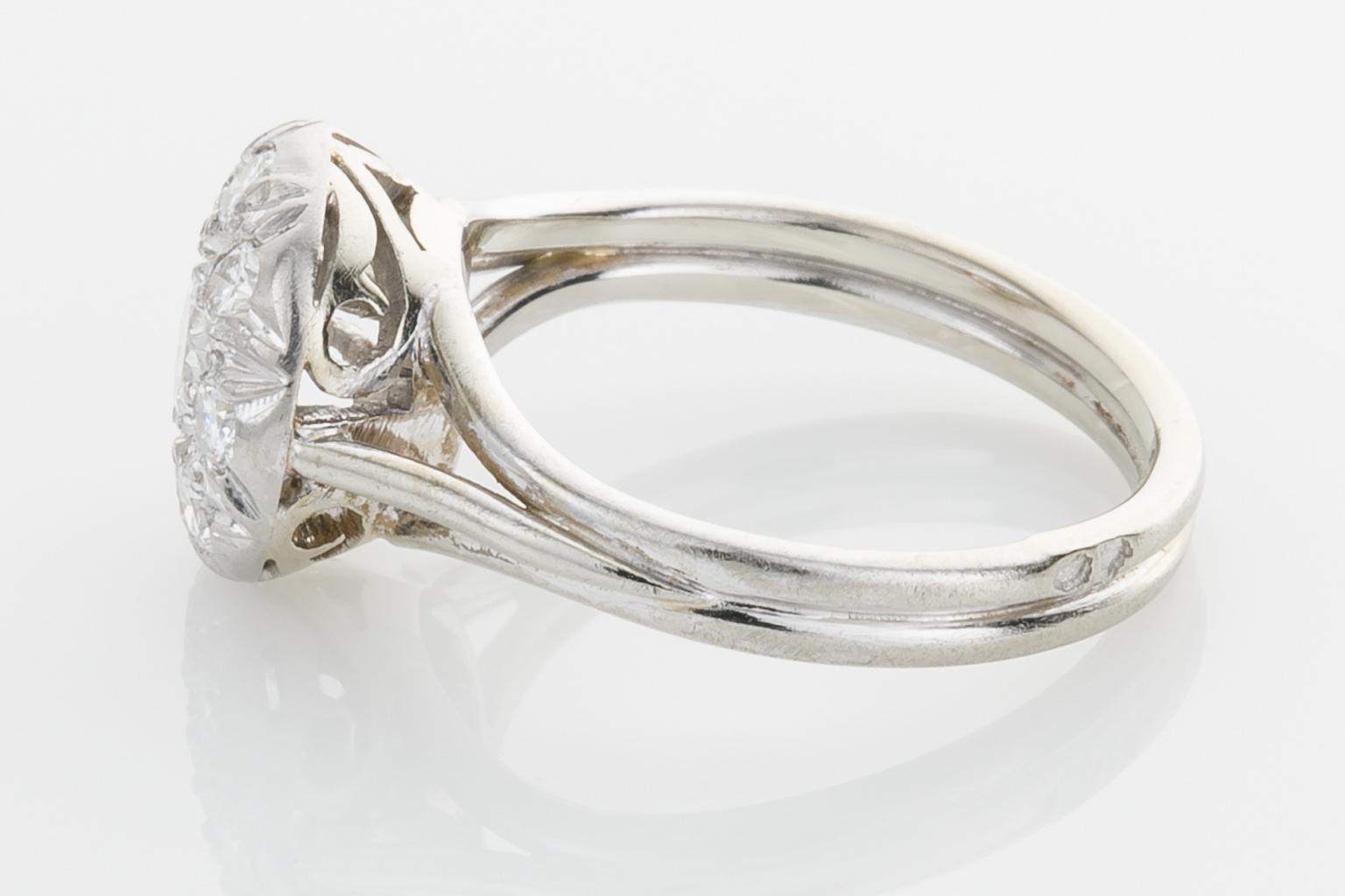 Round Cut Platinum and Diamond French Cluster Ring For Sale
