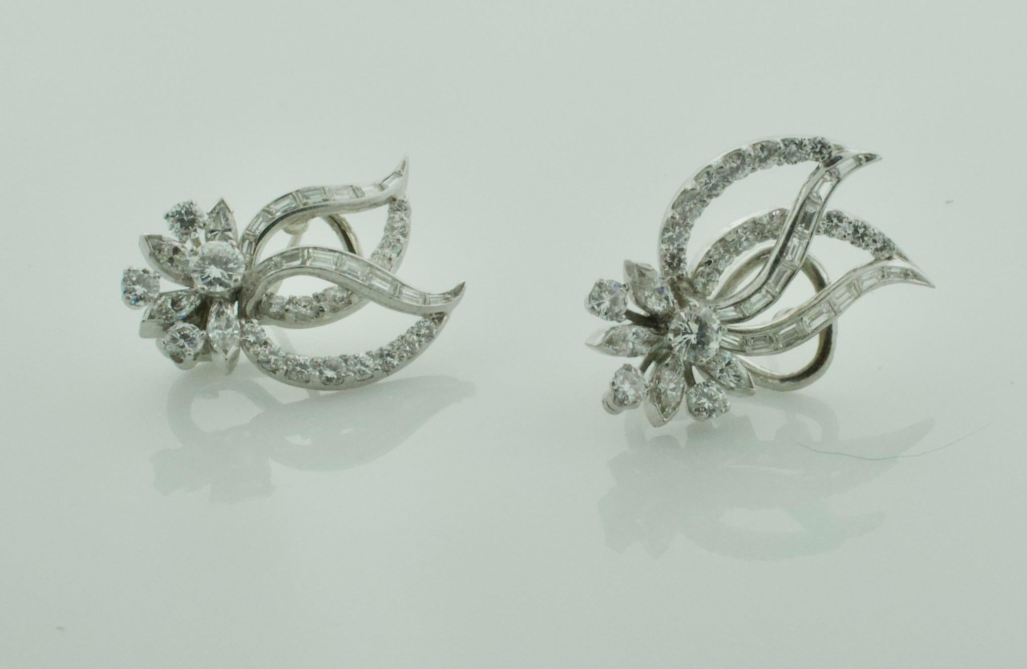 Platinum and Diamond Handmade Earrings Circa 1940's 4.35 carats
Left and Right 
Two Round Brilliant Cut Diamonds weighing .50 carats approximately [GH-VVS-SI1}
Thirty Two Round Brilliant Cut Diamonds weighing 1.15 carats approximately