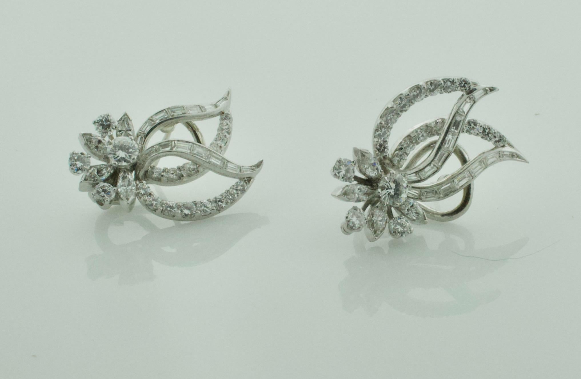 Timeless Elegance: Handmade Platinum and Diamond Earrings, Circa 1940's

Immerse yourself in the glamour and sophistication of the 1940s with these exquisite handmade platinum earrings. A true testament to artisanal mastery, this radiant pair