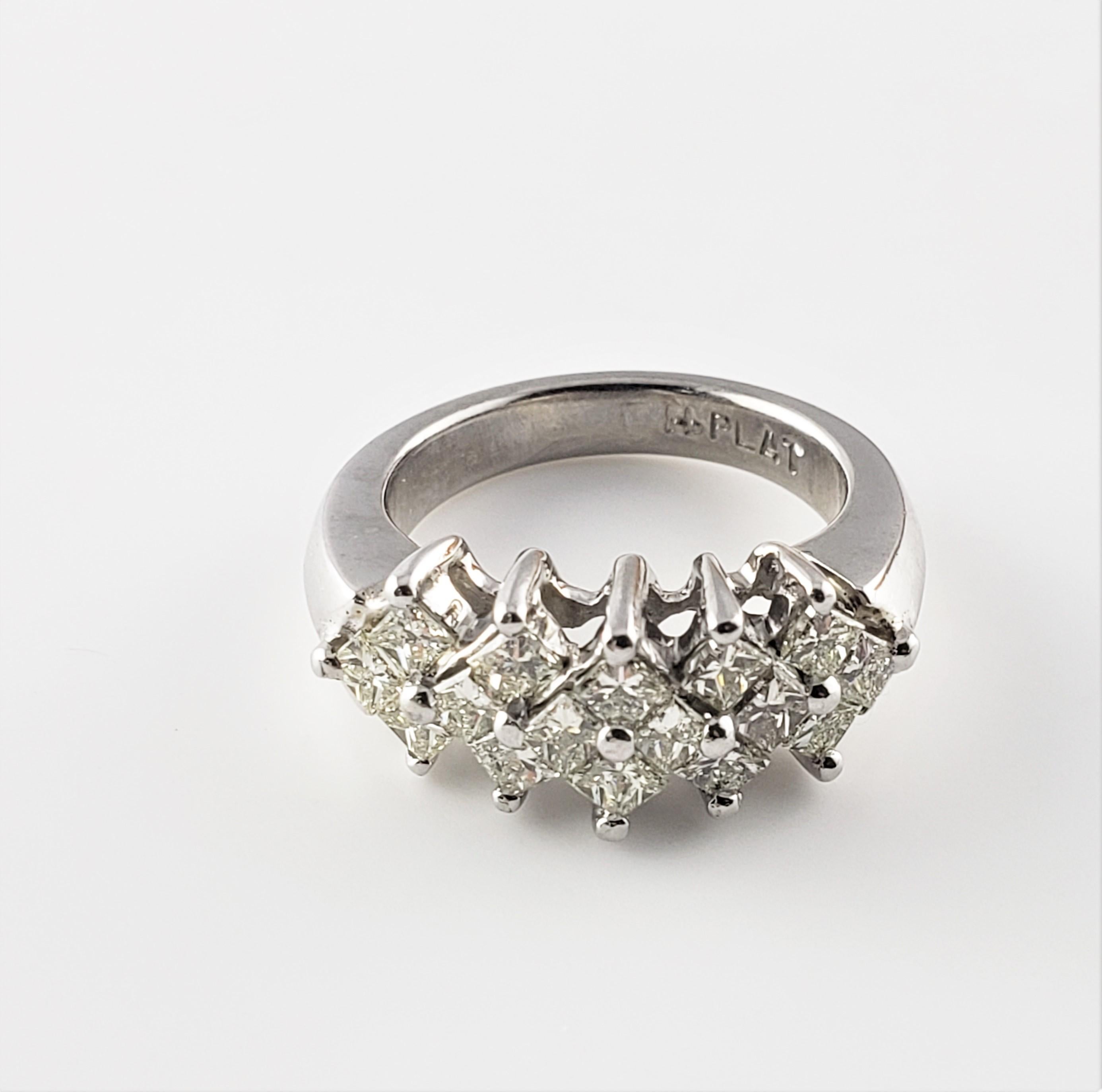 Platinum and Diamond Ring Size 5.5-

This sparkling ring features 16 princess cut diamonds set in platinum.  Width:  8 mm.  Shank: 3.5 mm.

Approximate total diamond weight:  1.28 ct.

Diamond color:  K-M

Diamond clarity:  SI1-VS2

Ring Size: