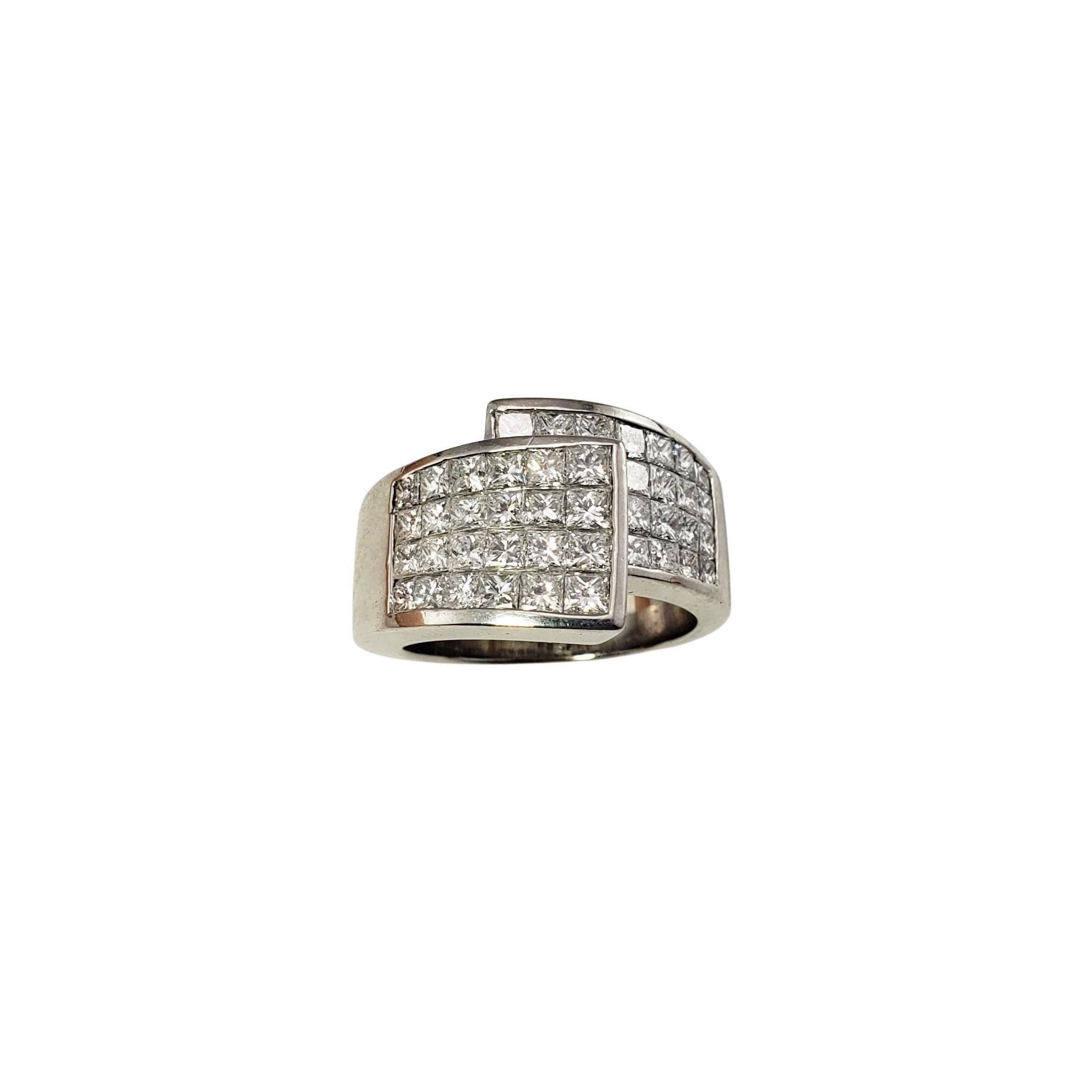 Platinum and Diamond Ring Size 7-

This sparkling ring features 43 princess cut diamonds set in beautifully detailed platinum.  Width:  14 mm.  Shank:  6 mm.

Approximate total diamond weight: 2.95 ct.

Diamond color: I

Diamond clarity: