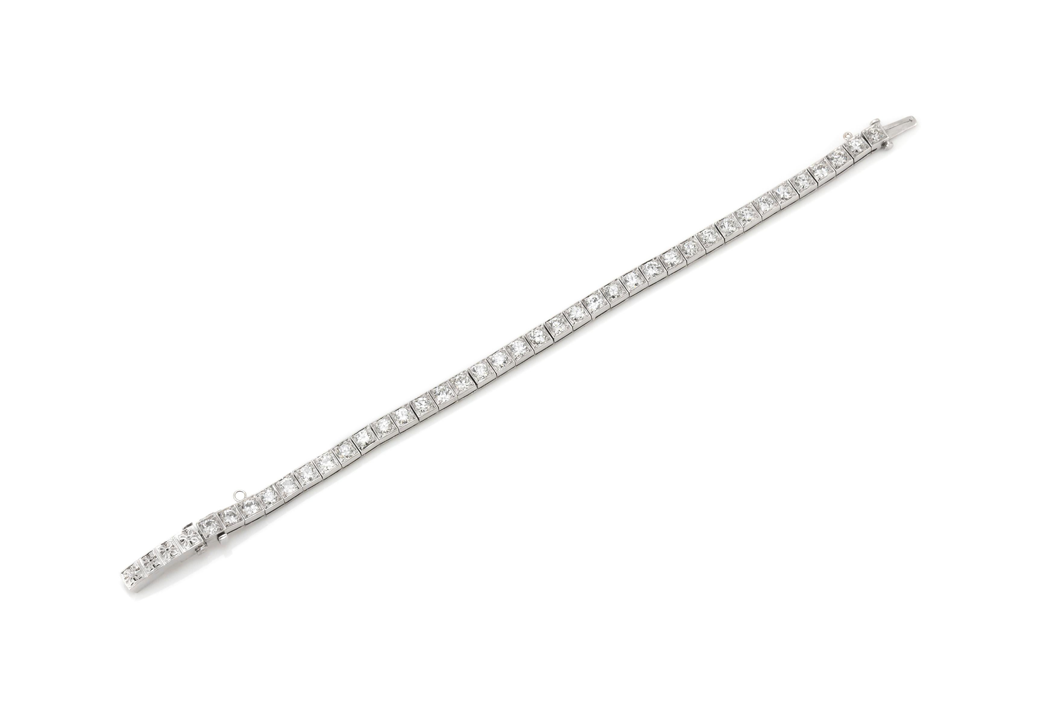 Beautiful straight line bracelet circa 1920 is finely crafted in platinum.
The diamonds weigh approximately 7.50ct