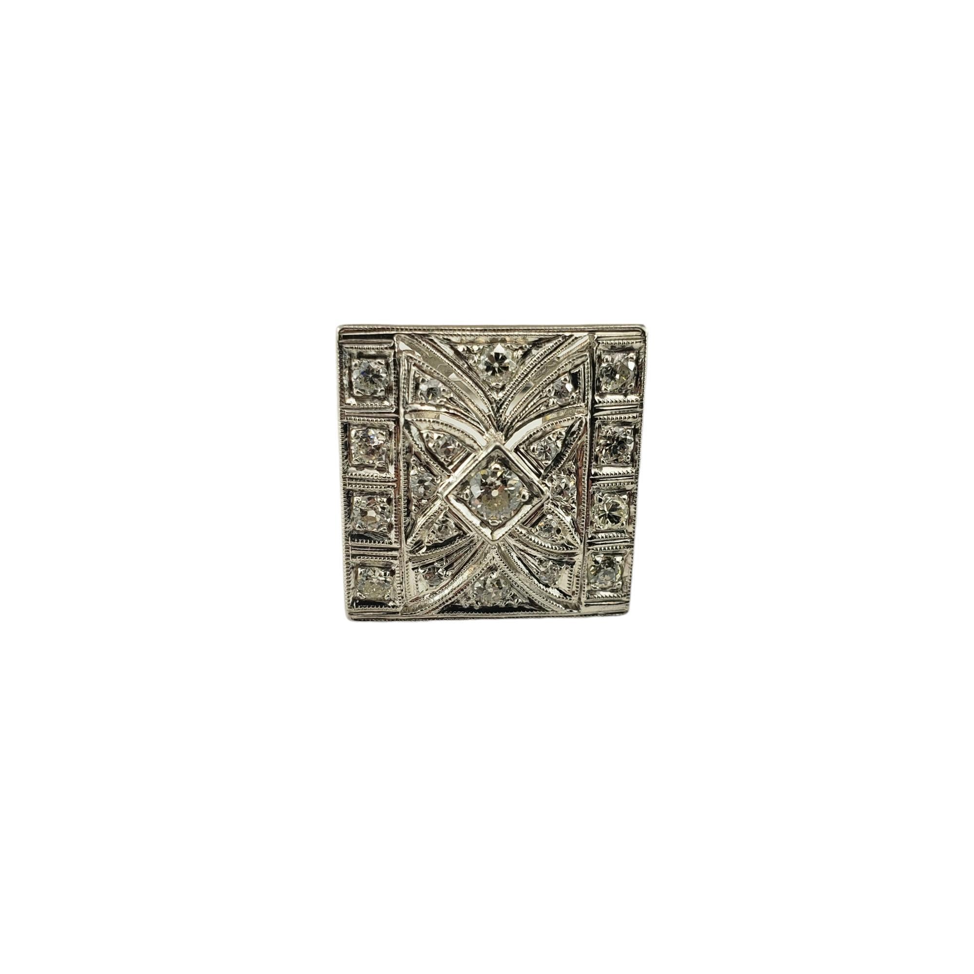 Platinum and Diamond Tile Ring Size 6.5 JAGi Certified-

This sparkling ring features 11 modern brilliant cut diamonds  (center: 0.17 ct.) and 10 round single cut diamonds set in beautifully detailed platinum.  

Top of ring measures 20 mm x 20 mm.