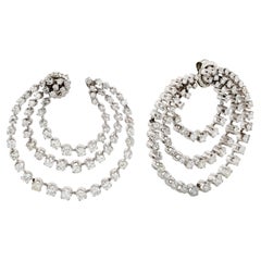 Boucles d'oreilles triple cercle en platine et diamant d'inspiration céleste