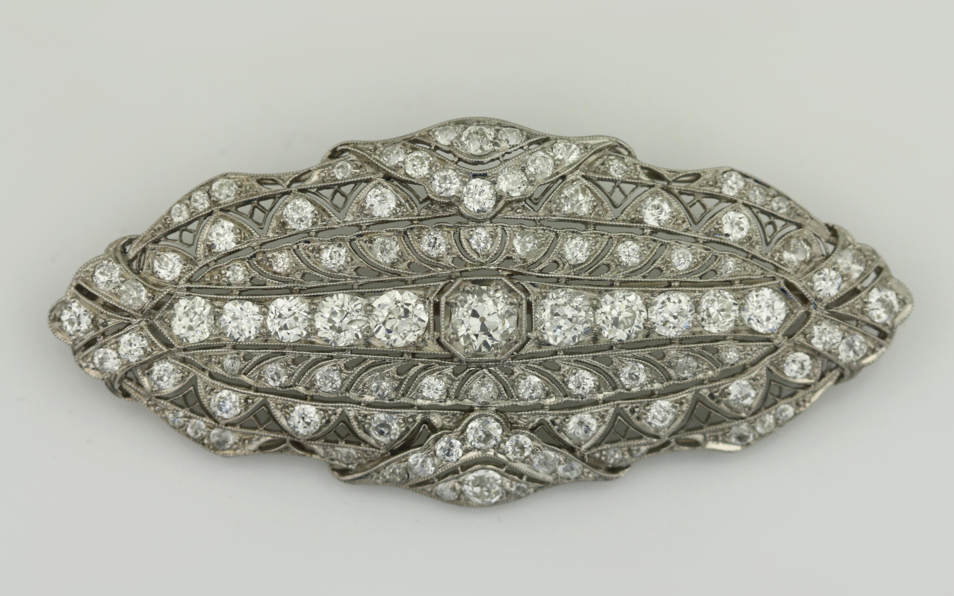 Round Cut Platinum and Diamond Vintage Brooch For Sale