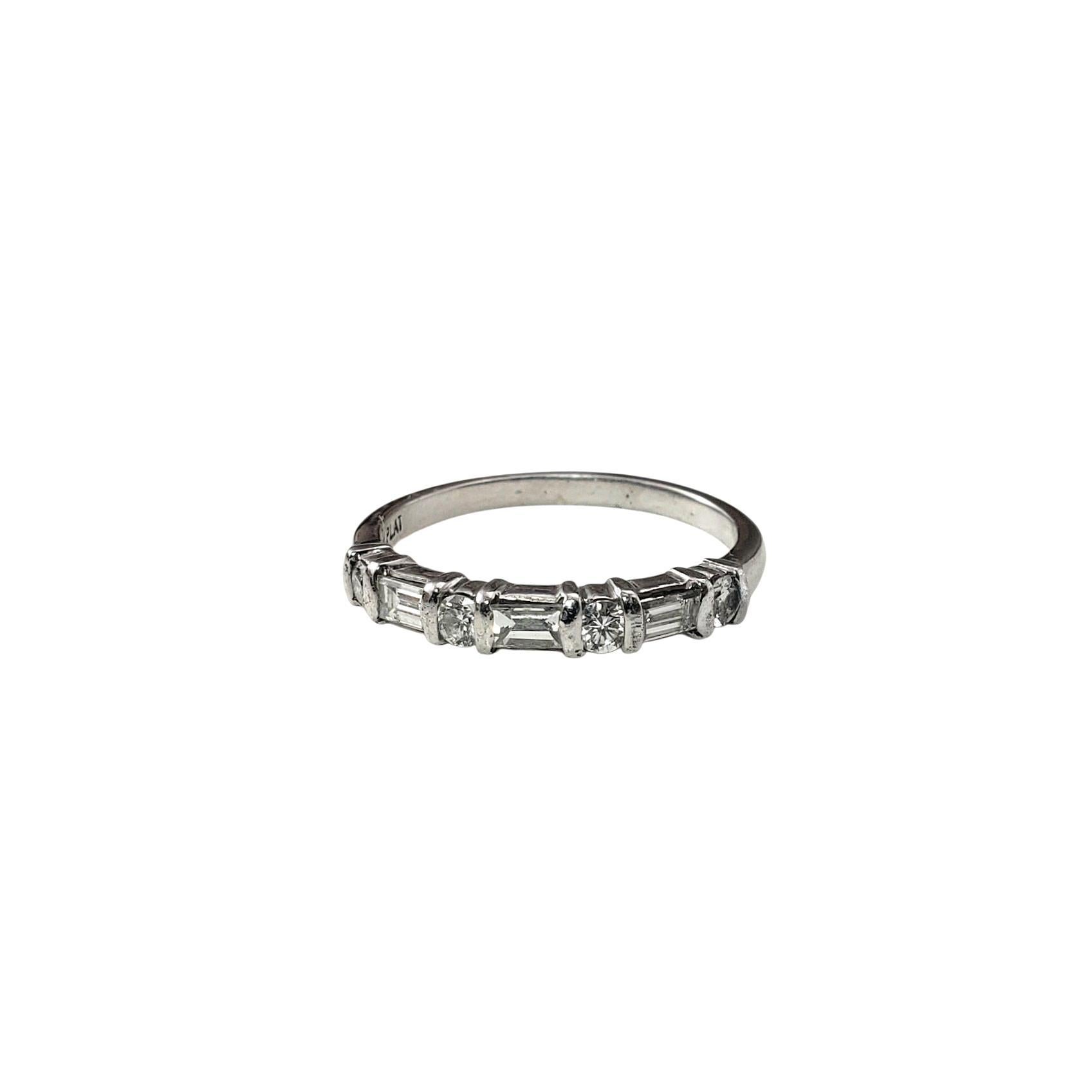 Platinum and Diamond Wedding/Anniversary Band Ring Size 7.5

This sparkling band features a timeless alternating pattern of four brilliant cut round diamonds and three sleek baguette diamond set in classic platinum. Perfect as a wedding band,