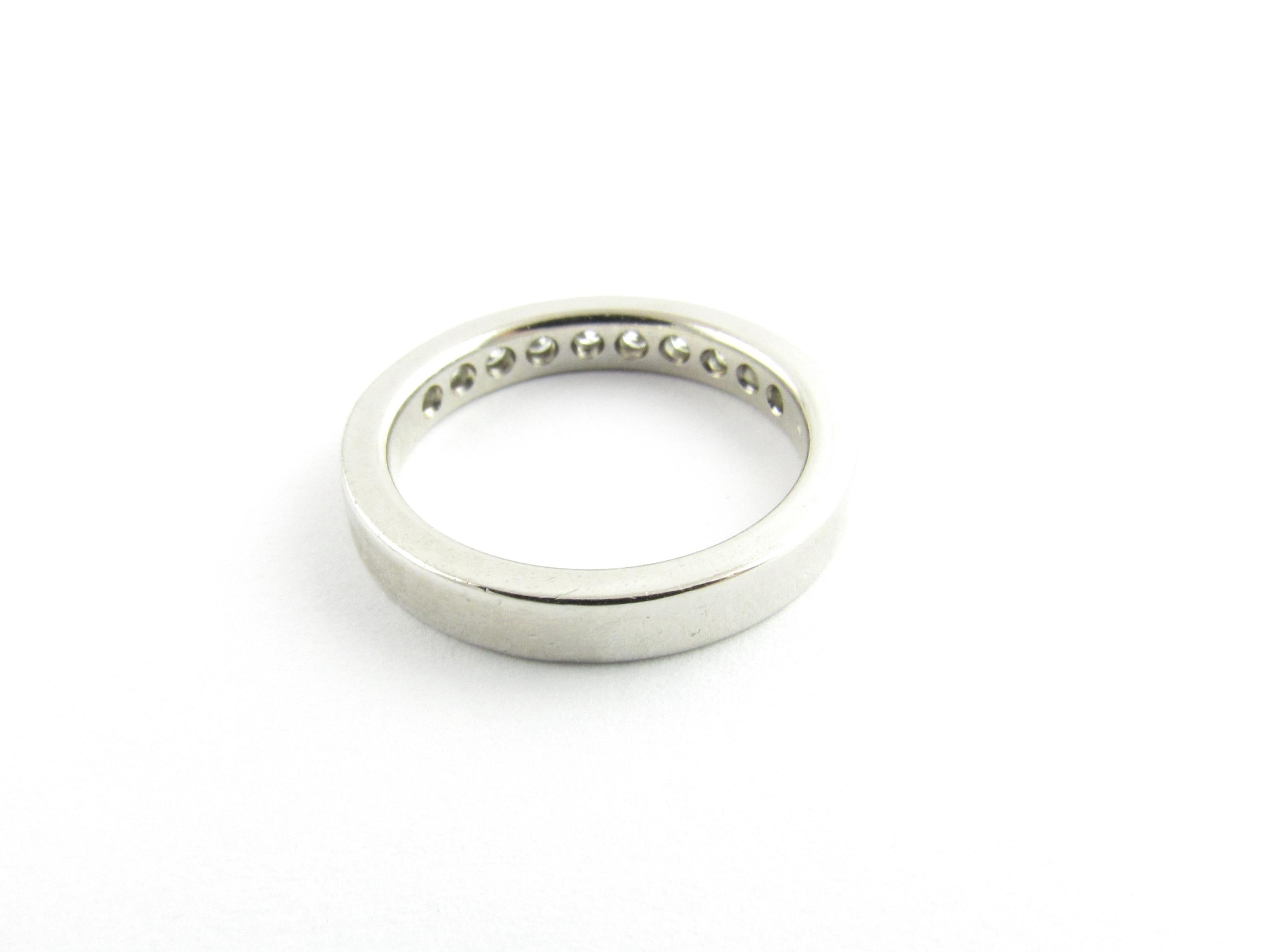 Round Cut Platinum and Diamond Wedding Band