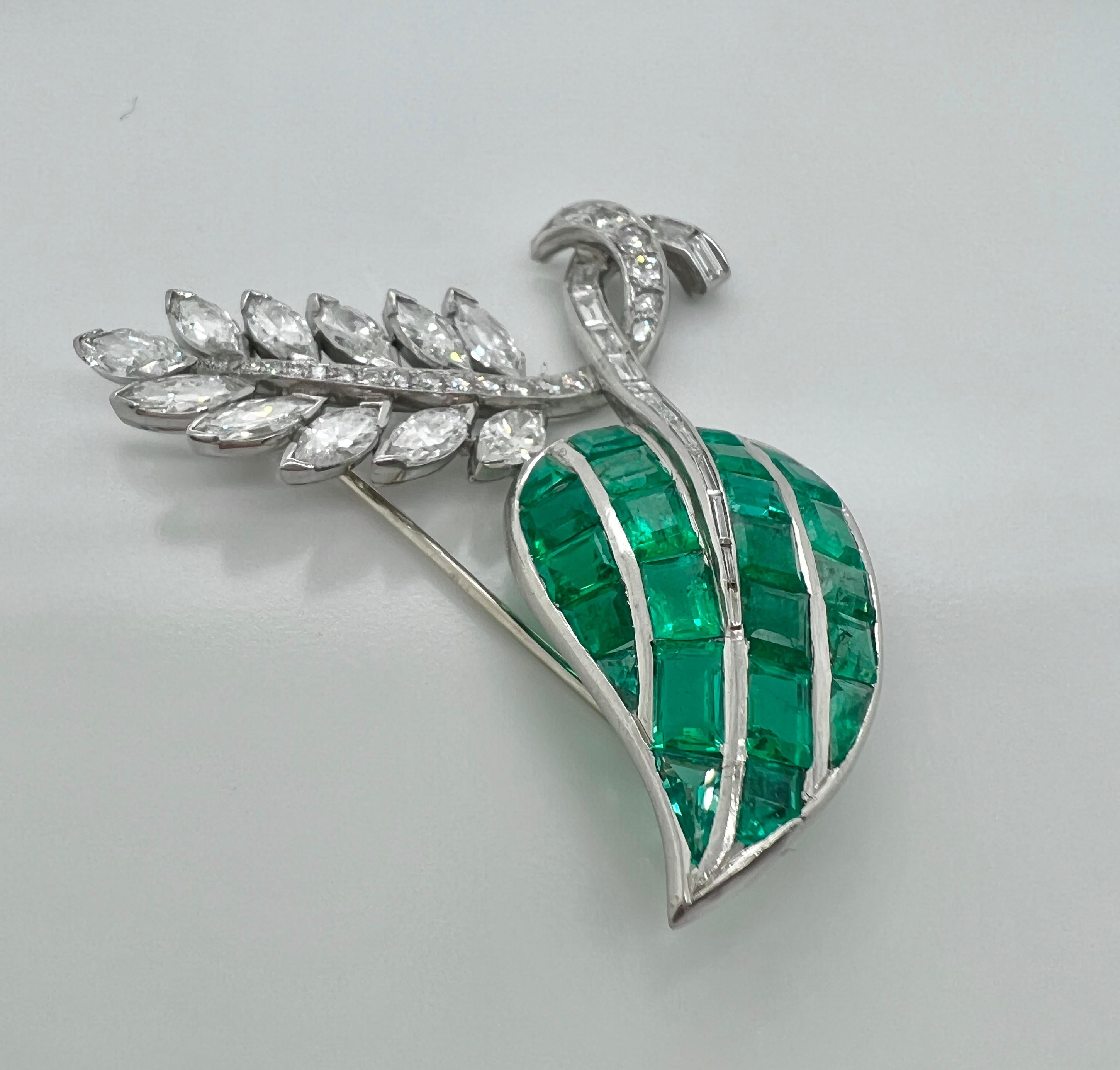 Platinum and Emerald Diamond Brooch.

Details:
Platinum, emerald, diamonds, about approx. 4.5 carats of diamonds, 6 carats of emerald. Circa 1970s. Weight 15.1 grams.

In excellent condition.
