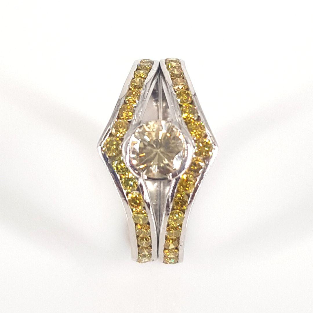 Round Cut Platinum and Fancy Yellow Diamond Ring For Sale