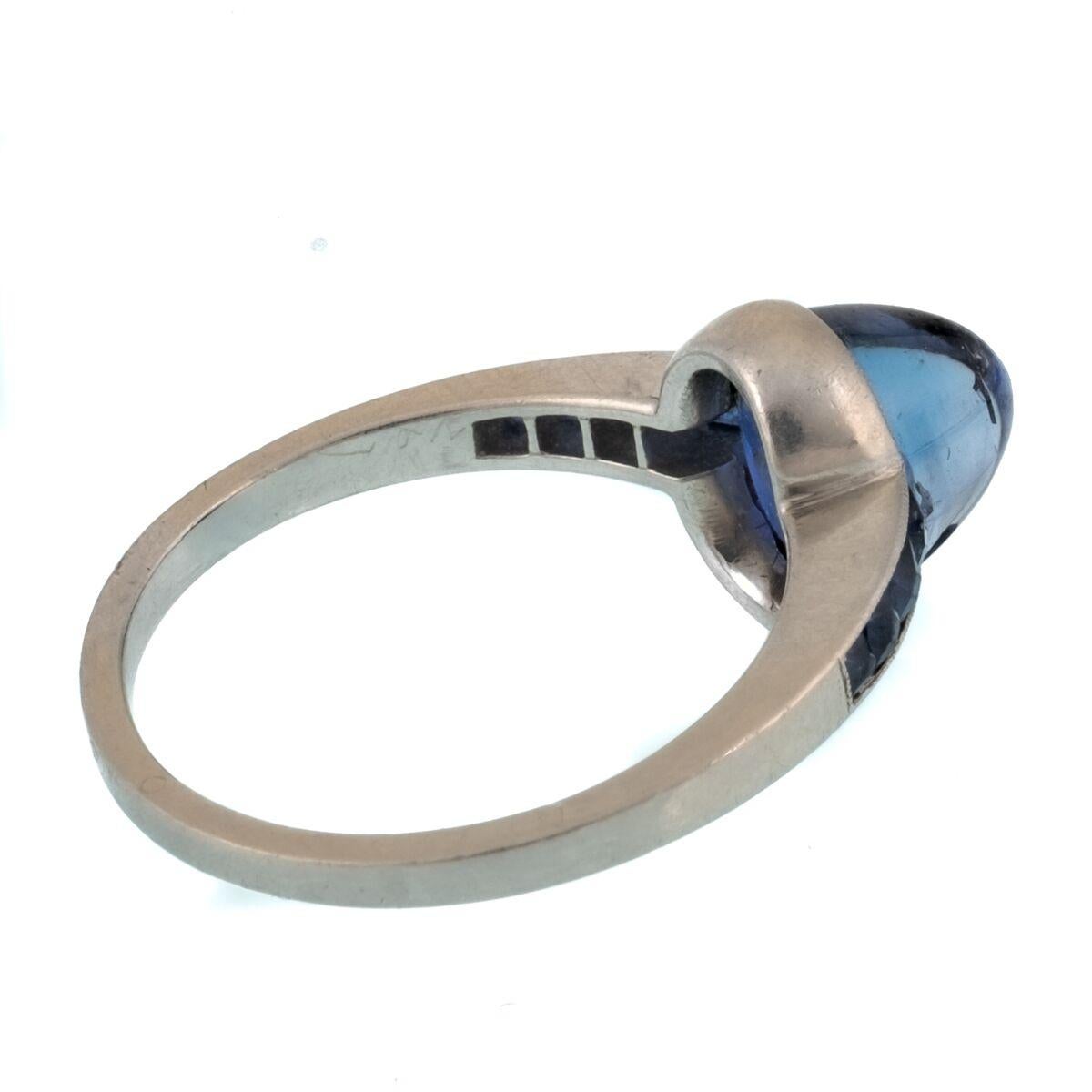 Platinum and French Cut Sapphires Featuring a 1.3 Carat Cabochon Sapphire Ring In Good Condition For Sale In New York, NY