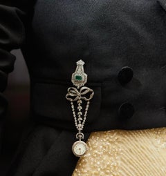 Platinum and 14K White Gold Diamond Pendant Watch with Sapphire Accents