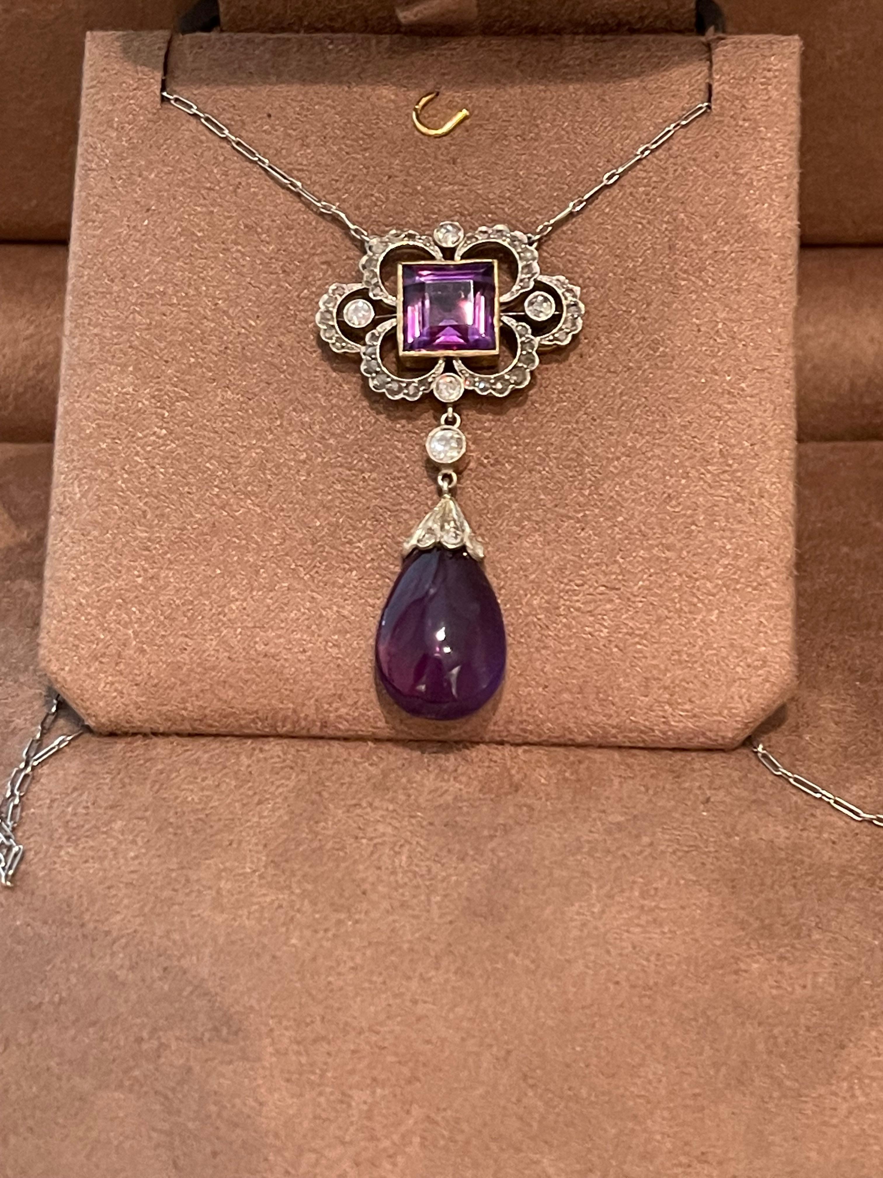 A lovely  Edwardian Amethyst briolette and diamond necklace in platinum, and yellow Gold, ca. 1910. The briolette is flexibly mounted by a gorgeous diamond setting dangling from a diamond set top, which is attached to a chain. The pendant measures