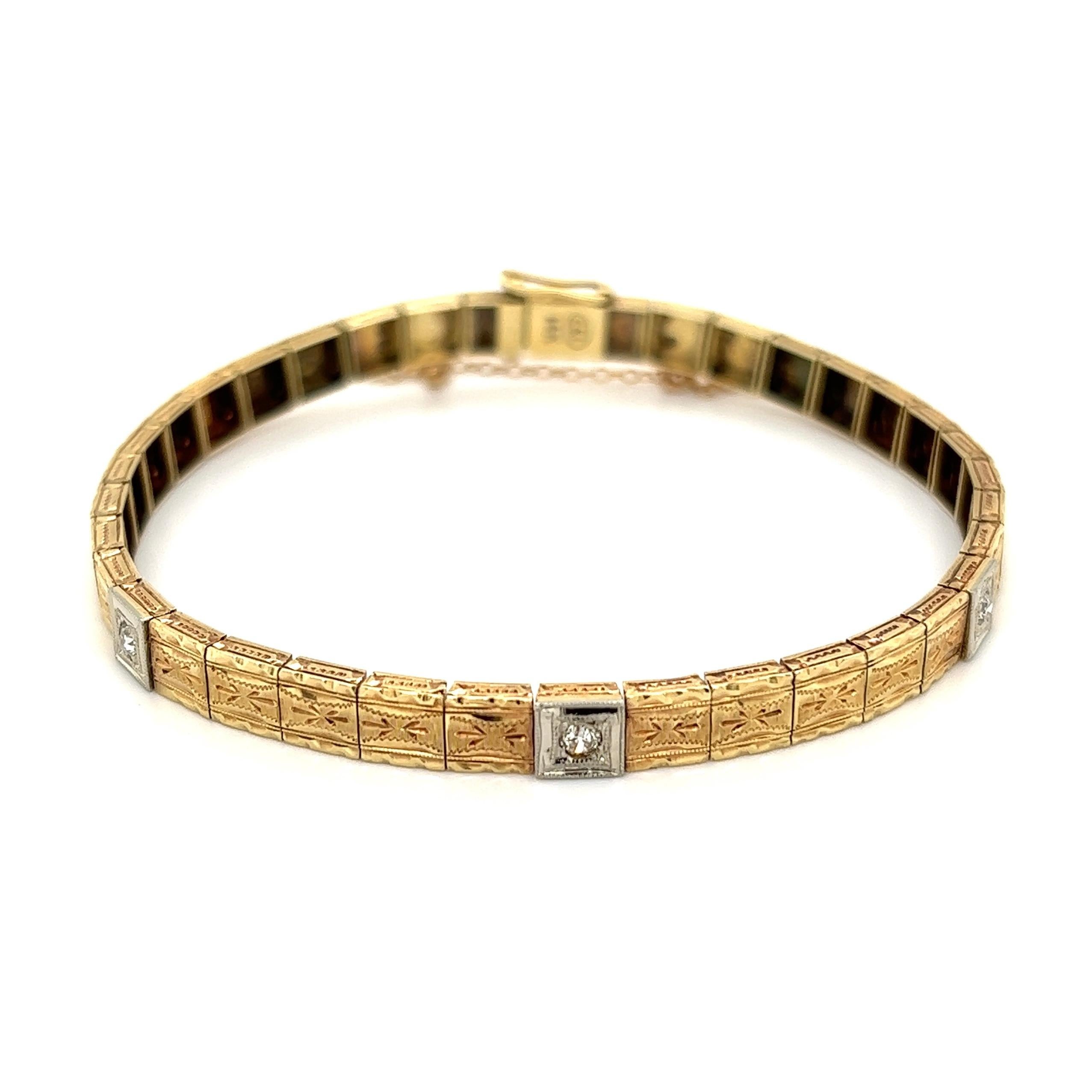 Diamond Line Tennis Bracelet. 14K Yellow Gold Square engraved Links inter-spaced with 3 Diamond stations set in Platinum. Hand set and Hand crafted in 14K Yellow Gold and Platinum. Bracelet measures approx. 7.25” long. Chic and Classic and so easy