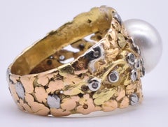 Anello di platino e oro con perle e diamanti