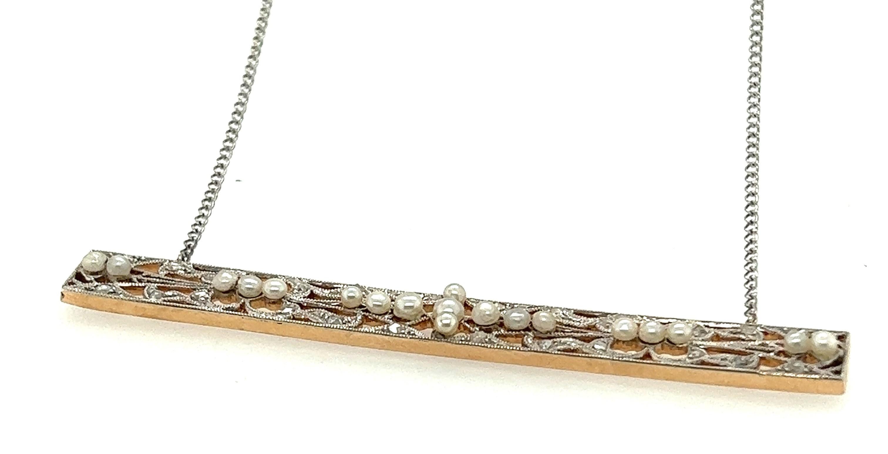 Platinum on top and 14kt yellow gold back .86tcw Rose Cut Diamond and pearl pendant on 20.25