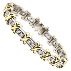 Platinum and Gold Two-Tone Diamond Tennis Bracelet with "X" Motif