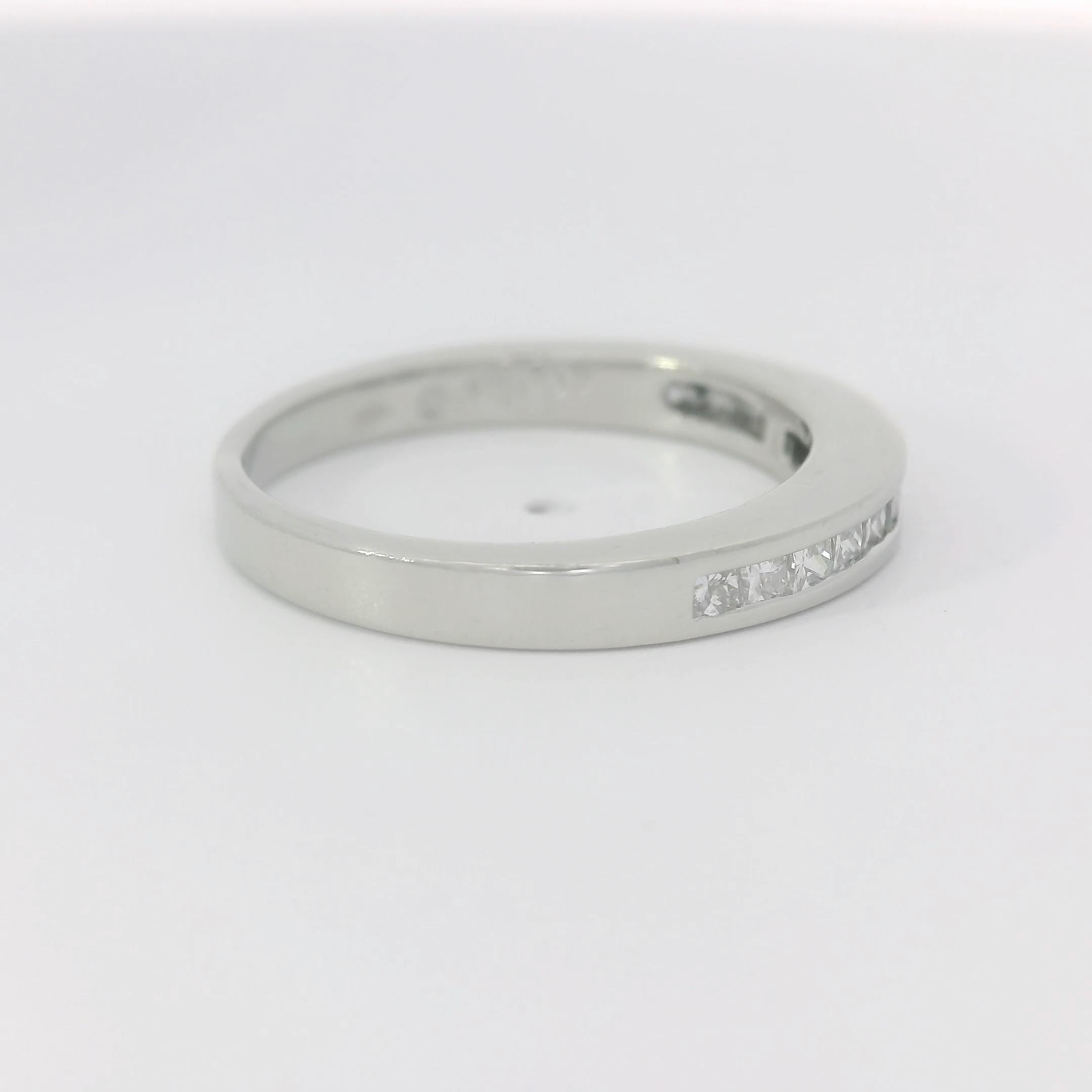 You'll love wearing this simple but classic diamond band. This elegant ring is 0.42 ctw of 14 dazzling princess cut diamonds with VS-SI clarity and G-H color. These gorgeous diamonds are set in 4 grams of platinum. Perfect to wear as a wedding band,