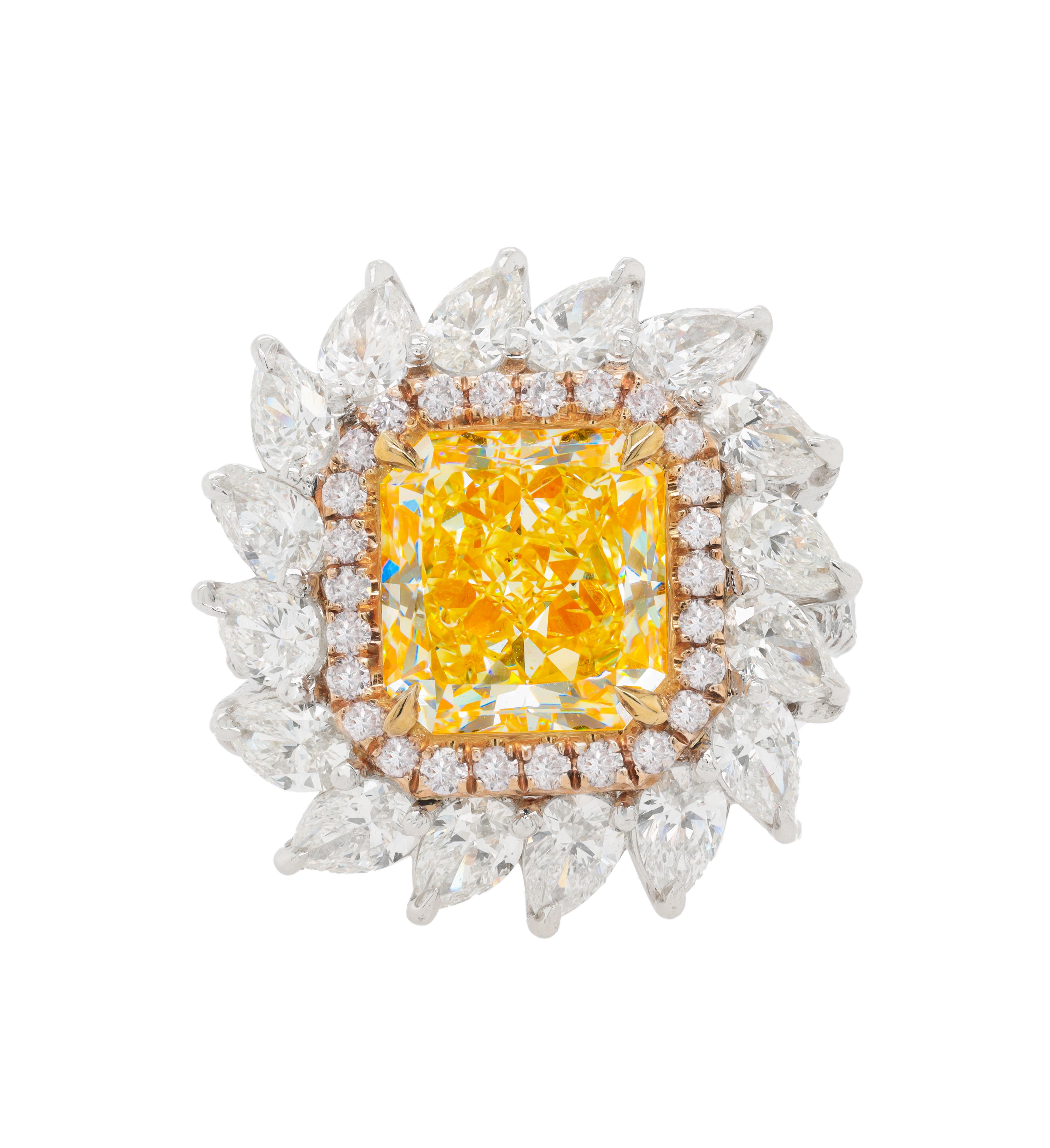 Platinum and rose and yellow gold ring featuring (radc 978)  4.57ct fancy  yellow si1 center diamond with one row halo setting with white diamonds  f-g color vs1-vs2 clarity and pink diamonds and accenting with 16 pear shape diamonds with cumulative