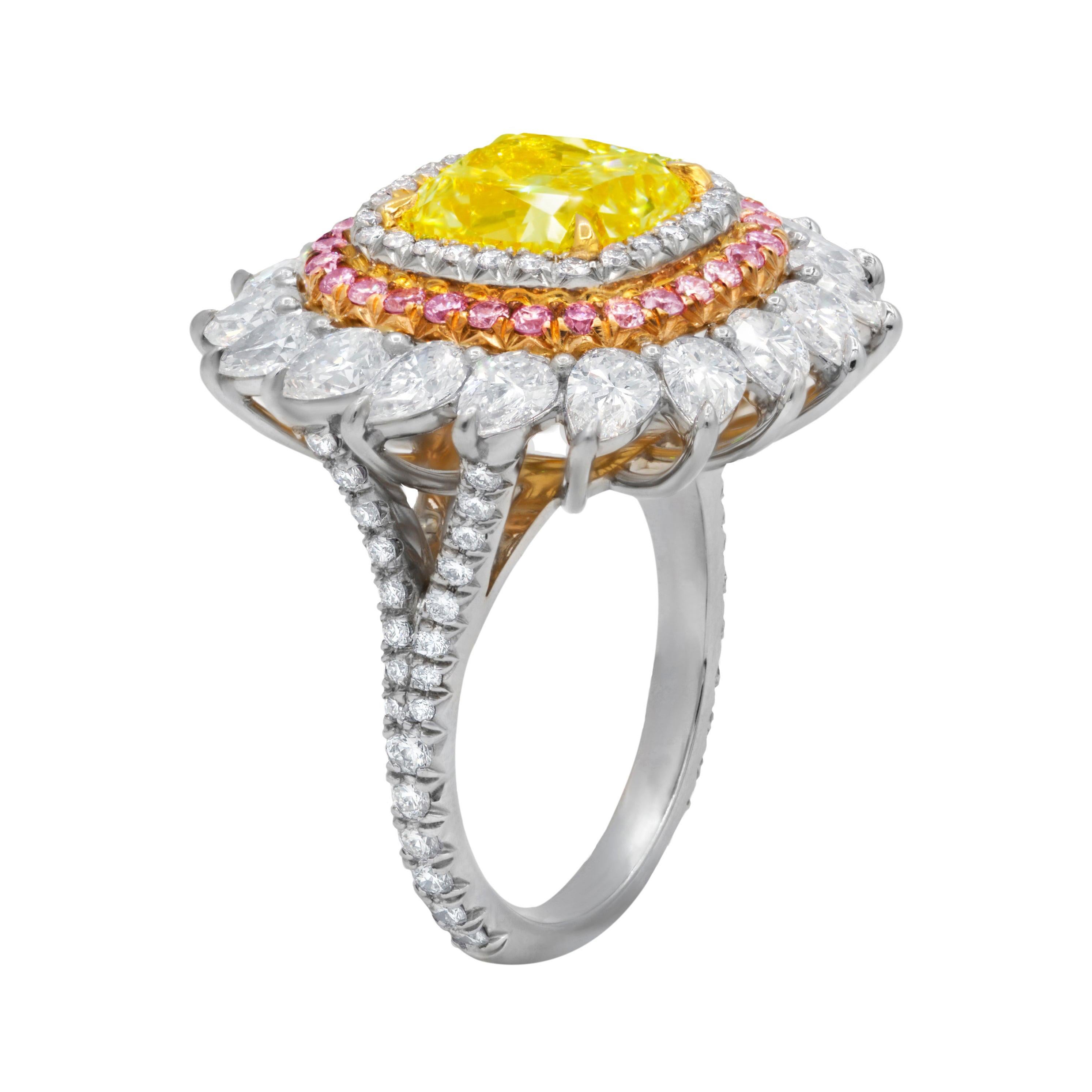 Platinum and rose and yellow gold ring featuring (radc 977)  4.03ct fancy light yellow vs1 center diamond with double row halos 
setting with white diamonds  f-g color vs1-vs2 clarity and pink diamonds and accenting with pear shape diamonds with