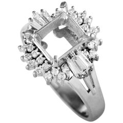 Platinum and Round and Tapered Baguette Diamond Mounting Ring
