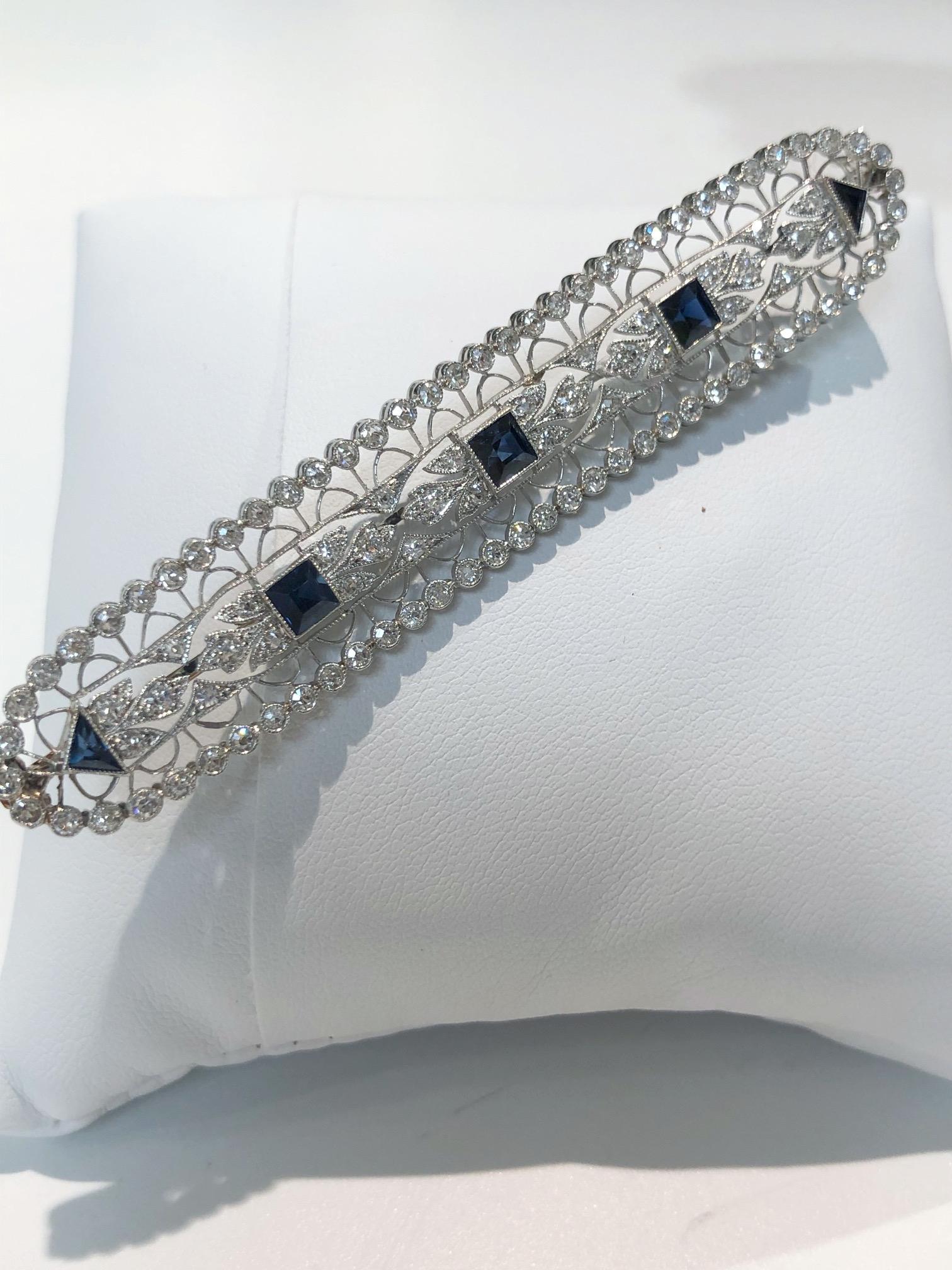 Brilliant Cut Platinum and Sapphire Brooch For Sale