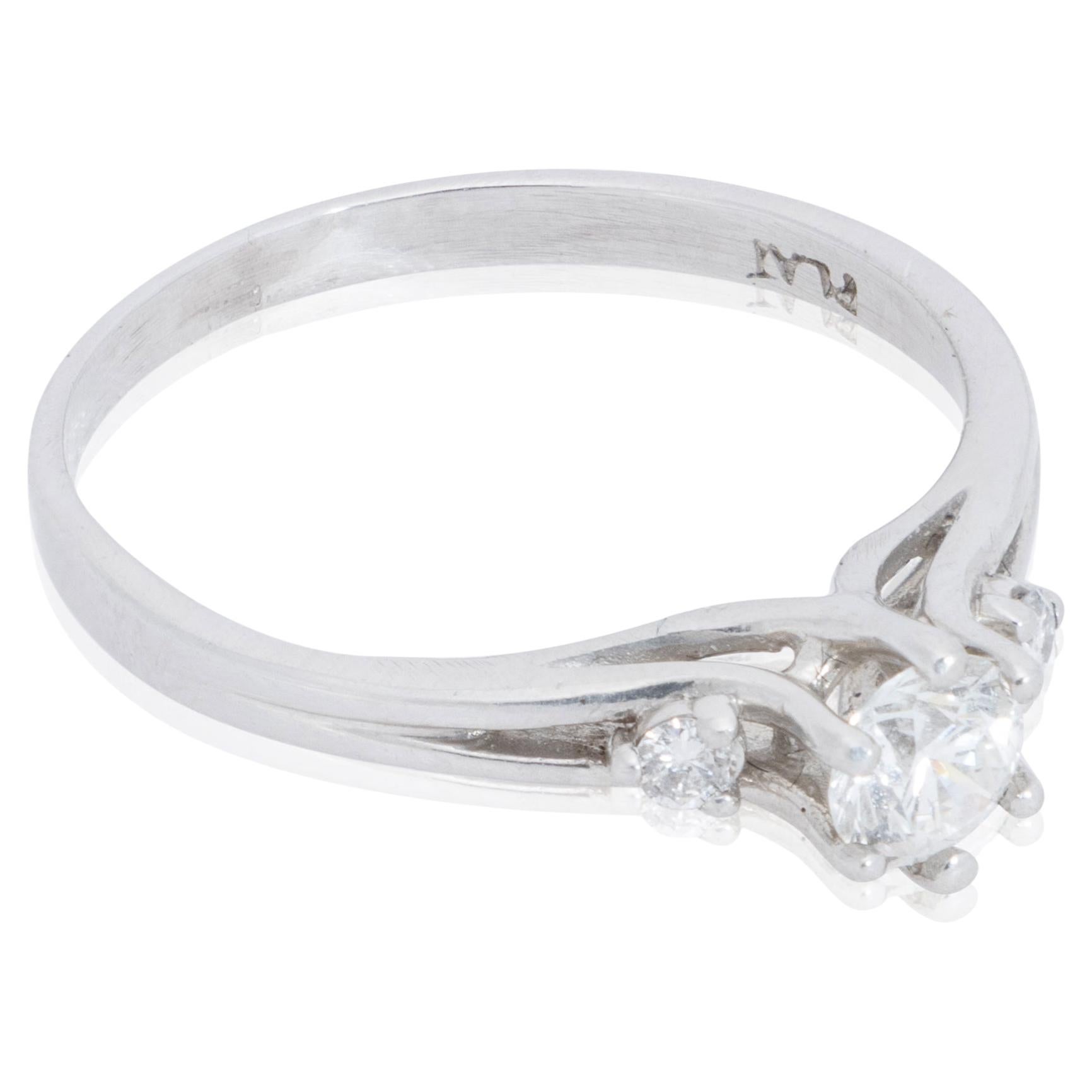 Platinum and Three-Stone Diamond Engagement Ring