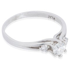 Platinum and Three-Stone Diamond Engagement Ring
