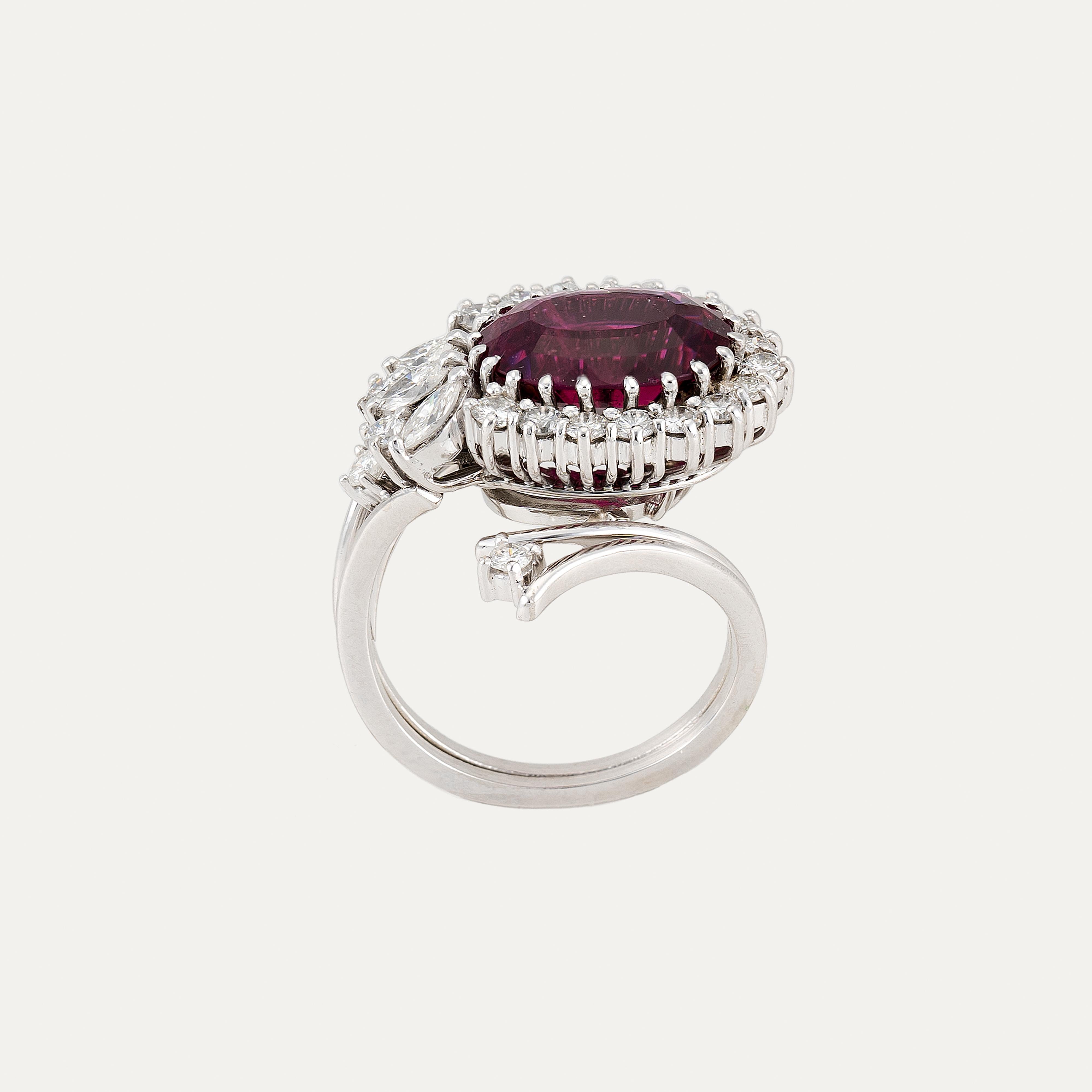 Vintage Platinum and White Gold Ring with 4.5ct Pink Tourmaline and Diamonds

A bold expression of vintage elegance, this unique cocktail ring pairs the icy brilliance of platinum with the soft warmth of white gold, joined by a distinctive