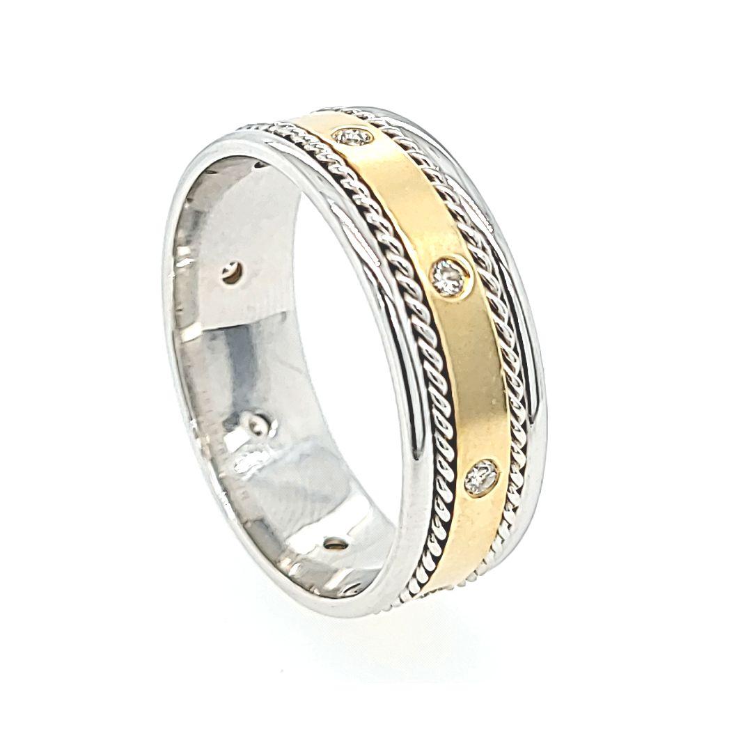 Men's Platinum and 18 Karat Yellow Gold 7.5mm Wide Band Featuring 8 Round Brilliant Cut Diamonds of VS Clarity and G Color Totaling 0.16 Carats. Brushed Center, Rope Design, and High Polish Edges. Finger Size 11. Finished Weight Is 10 Grams.