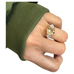 Platinum and Yellow Gold Ring Fancy Yellow 3.21 cts GIA and 2 trillion 1.20 cts