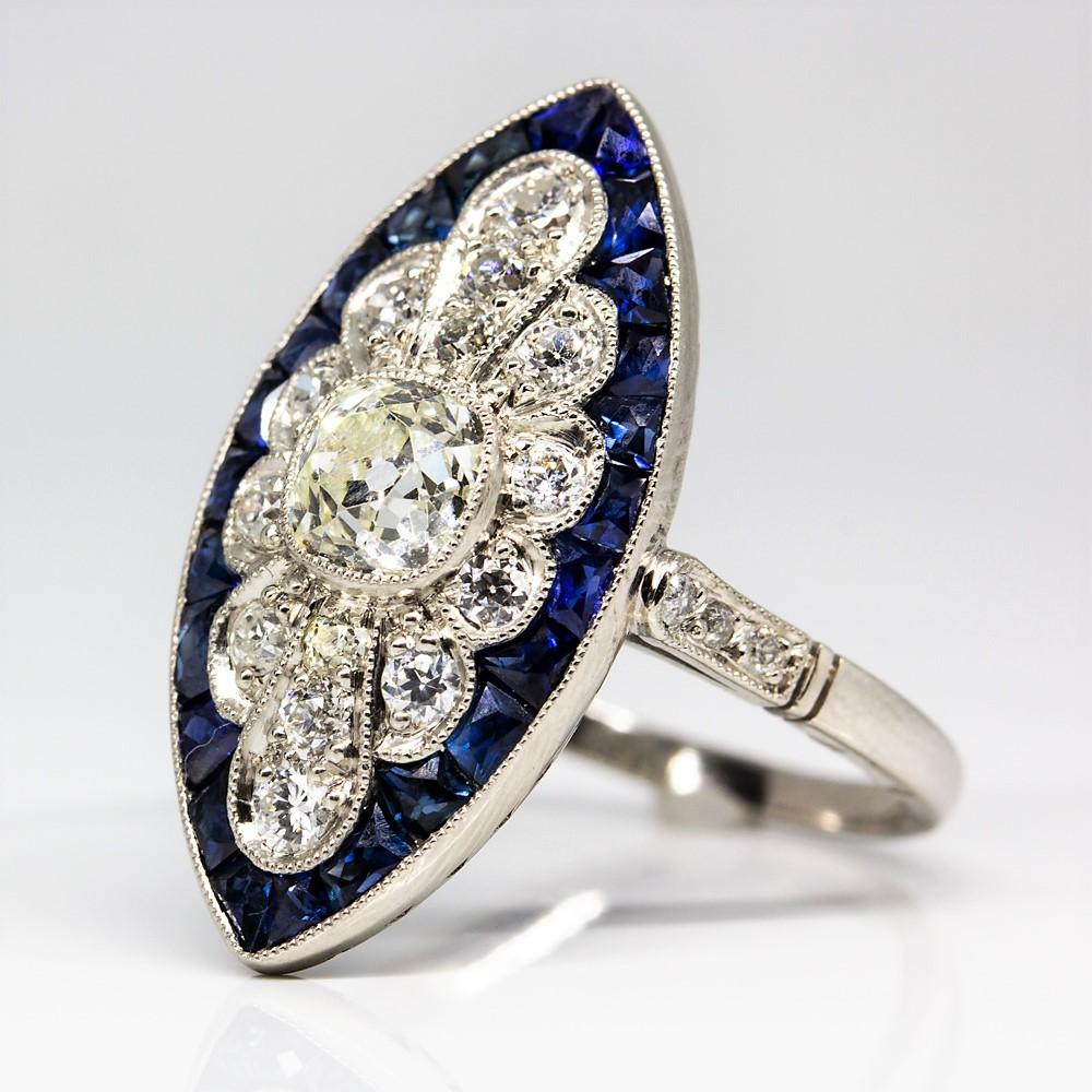 Old Mine Cut Platinum Antique Diamond and Calibrated Cut Sapphires Ring