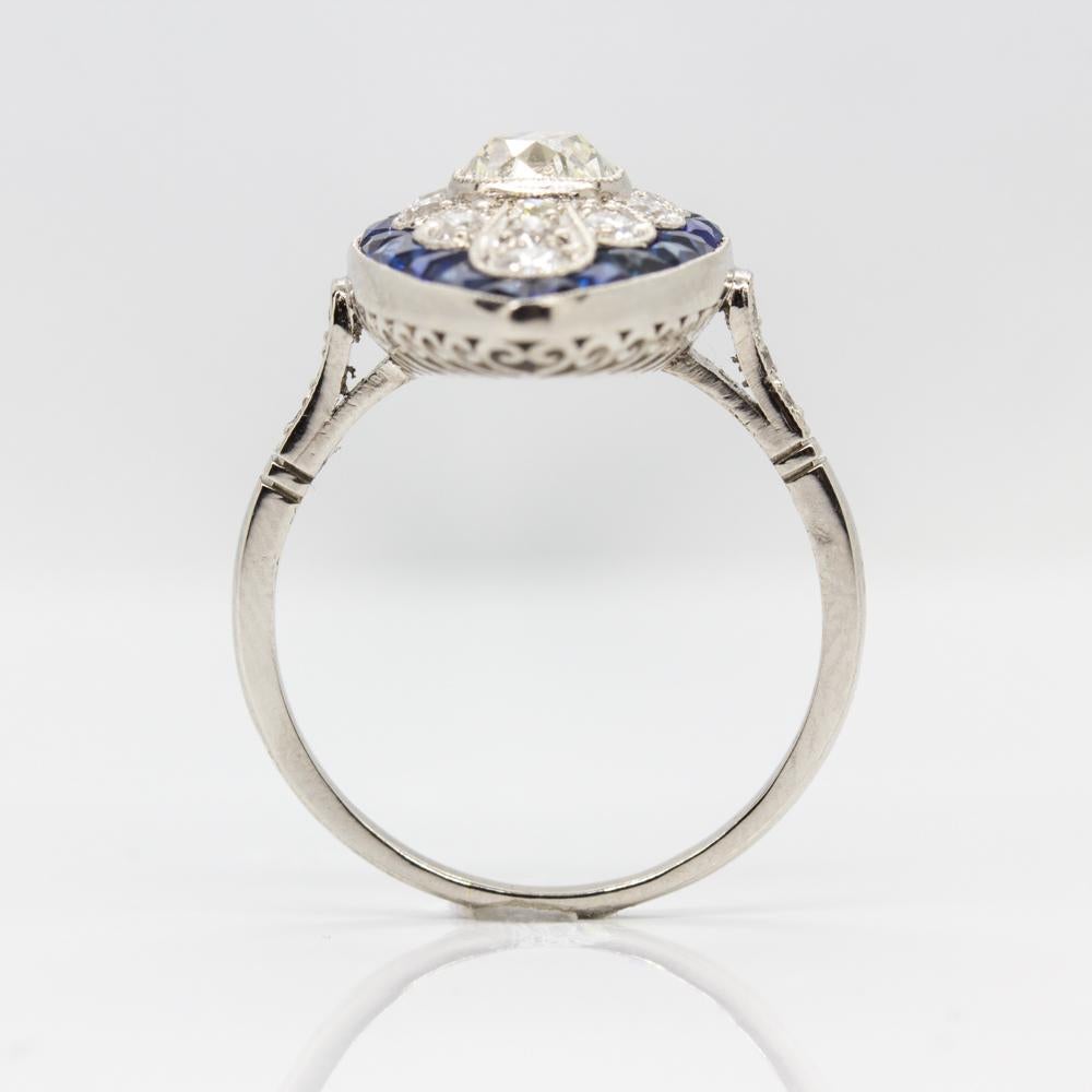 Platinum Antique Diamond and Calibrated Cut Sapphires Ring In Excellent Condition In Miami, FL